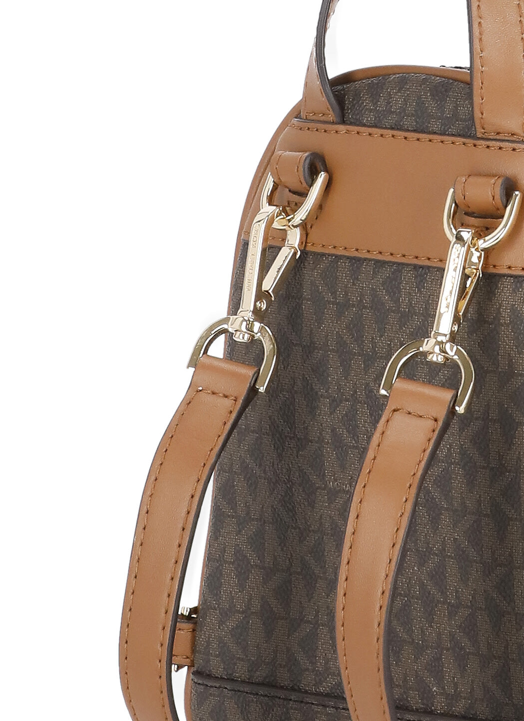 Shop Michael Michael Kors Mini Rhea Backpack In Brown