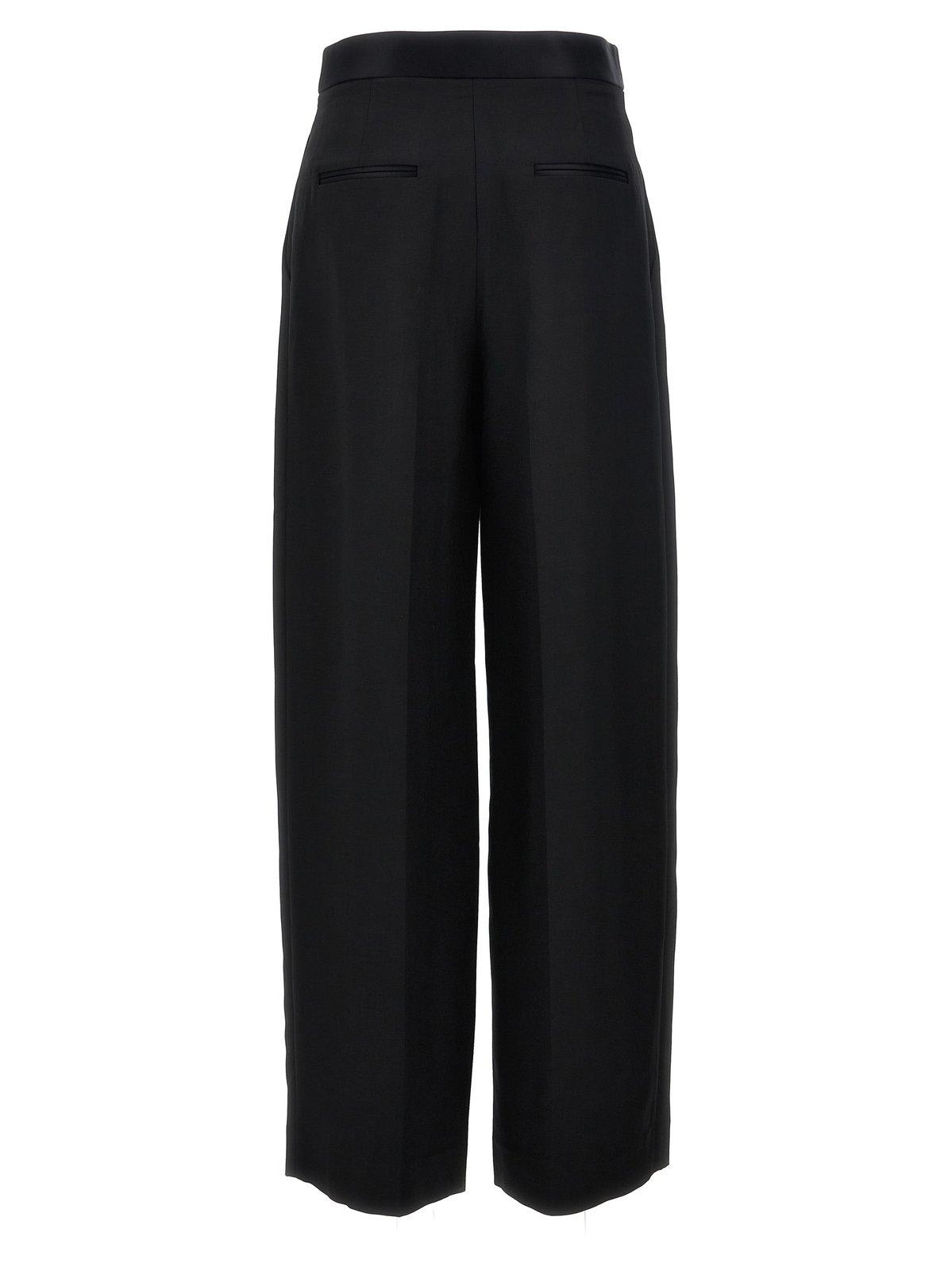 Shop Khaite Marine Low-rise Wide-leg Pants In Black