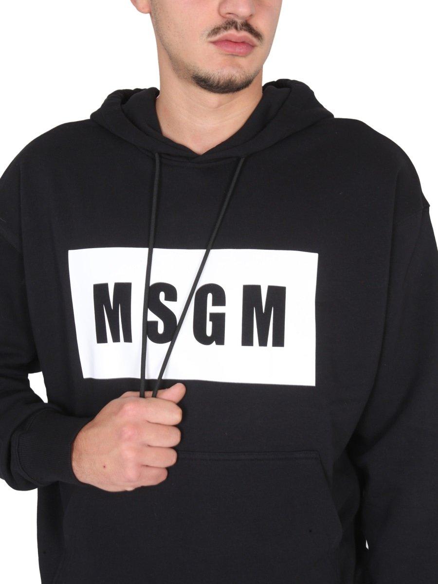 Shop Msgm Logo-printed Drawstring Hoodie In Black