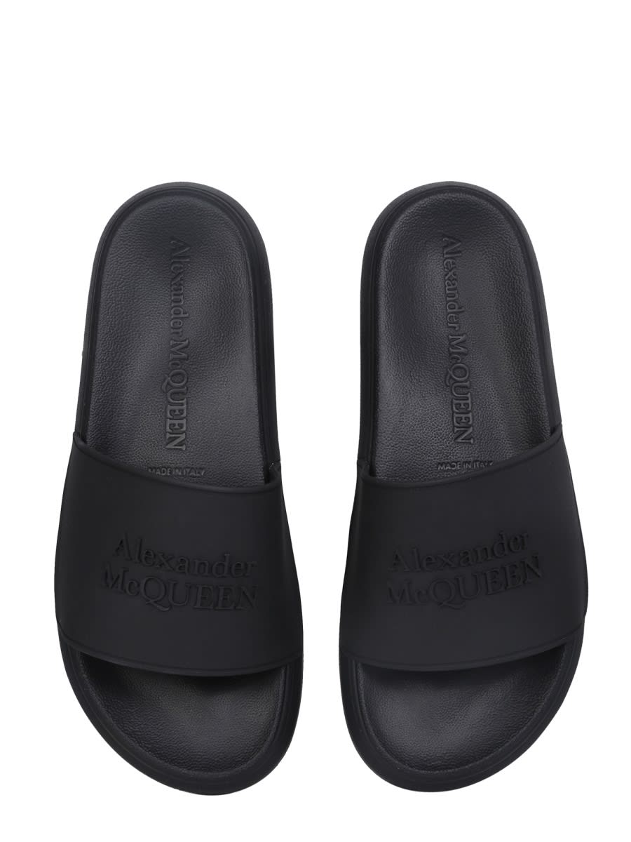 Shop Alexander Mcqueen Rubber Slide Sandals In Black