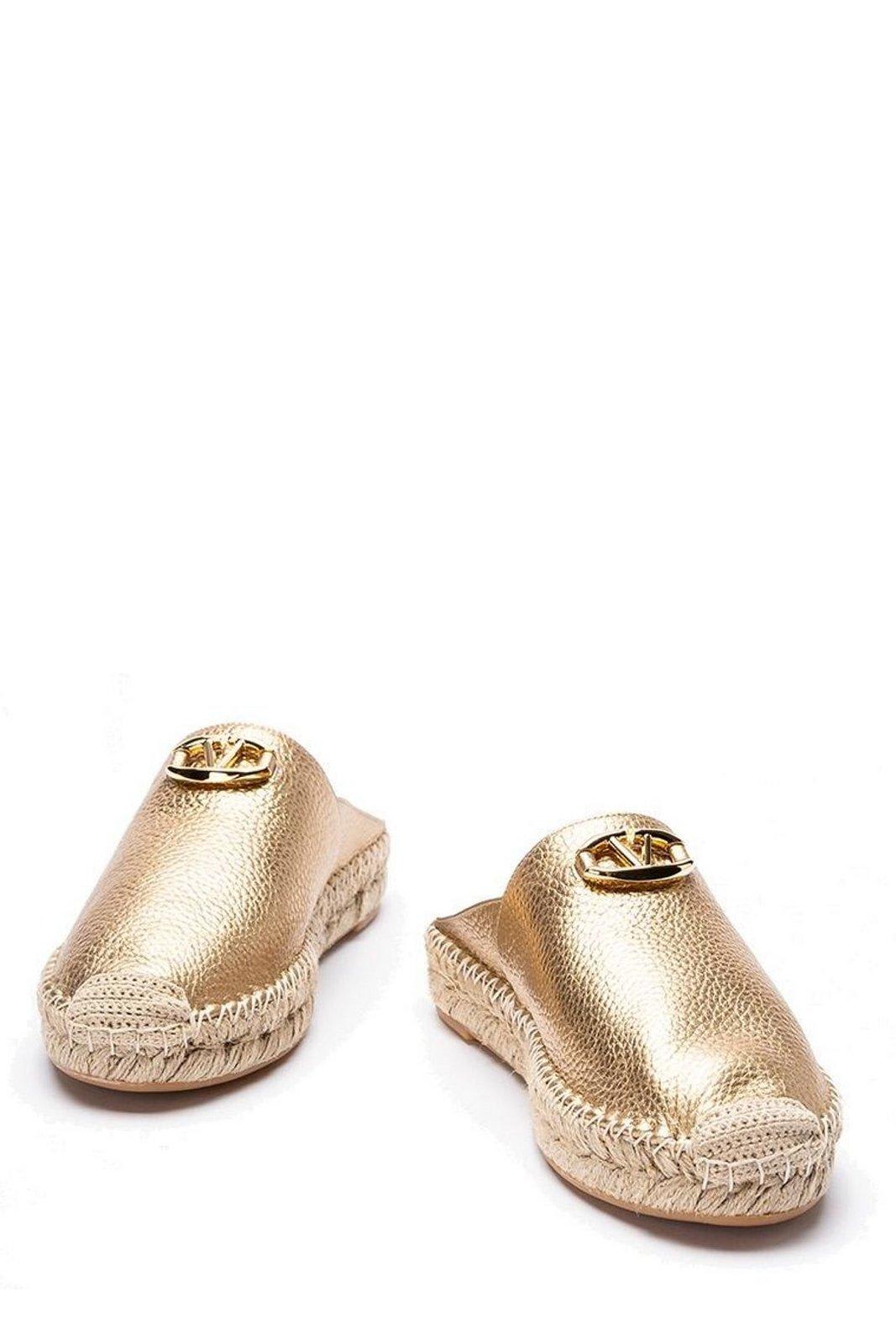 Shop Valentino Garavani Vlogo Plaque Round-toe Mules In Golden