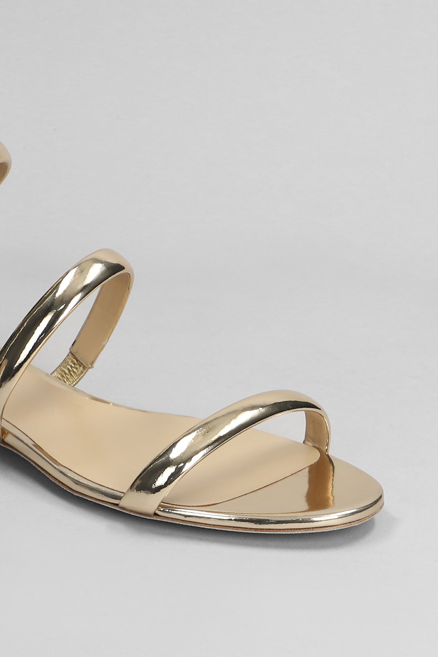 René Caovilla Serpente Sandals In Gold Leather In Gold