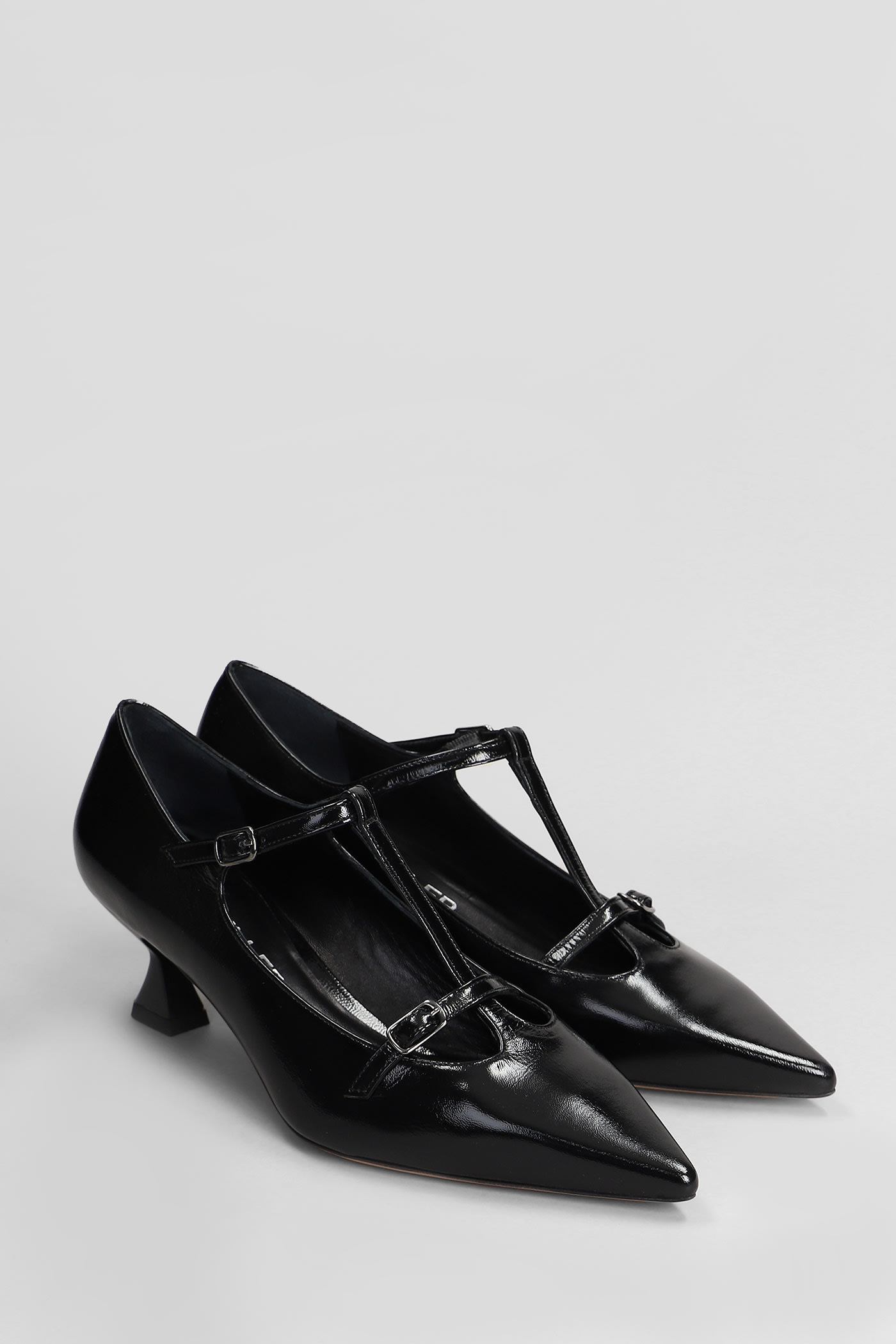 Shop The Seller Pumps In Black Patent Leather