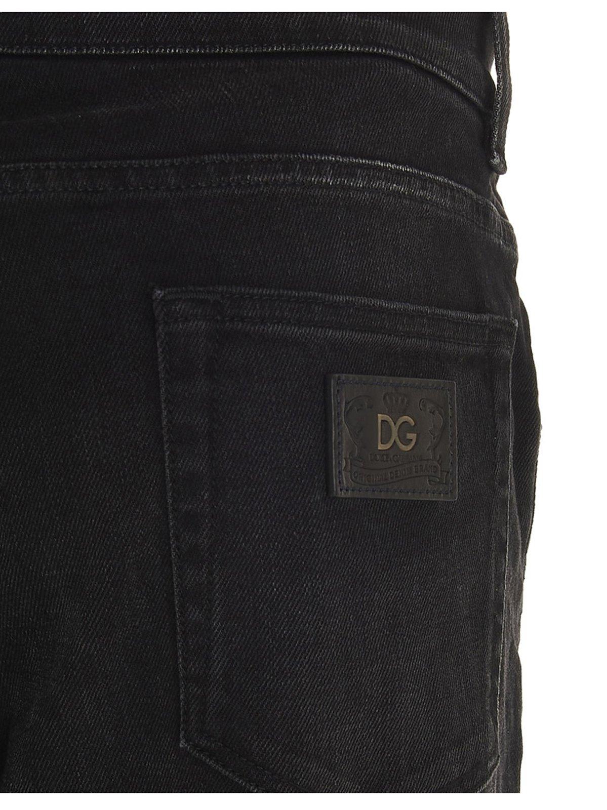 Shop Dolce & Gabbana Logo Patch Jeans In Varabbinata