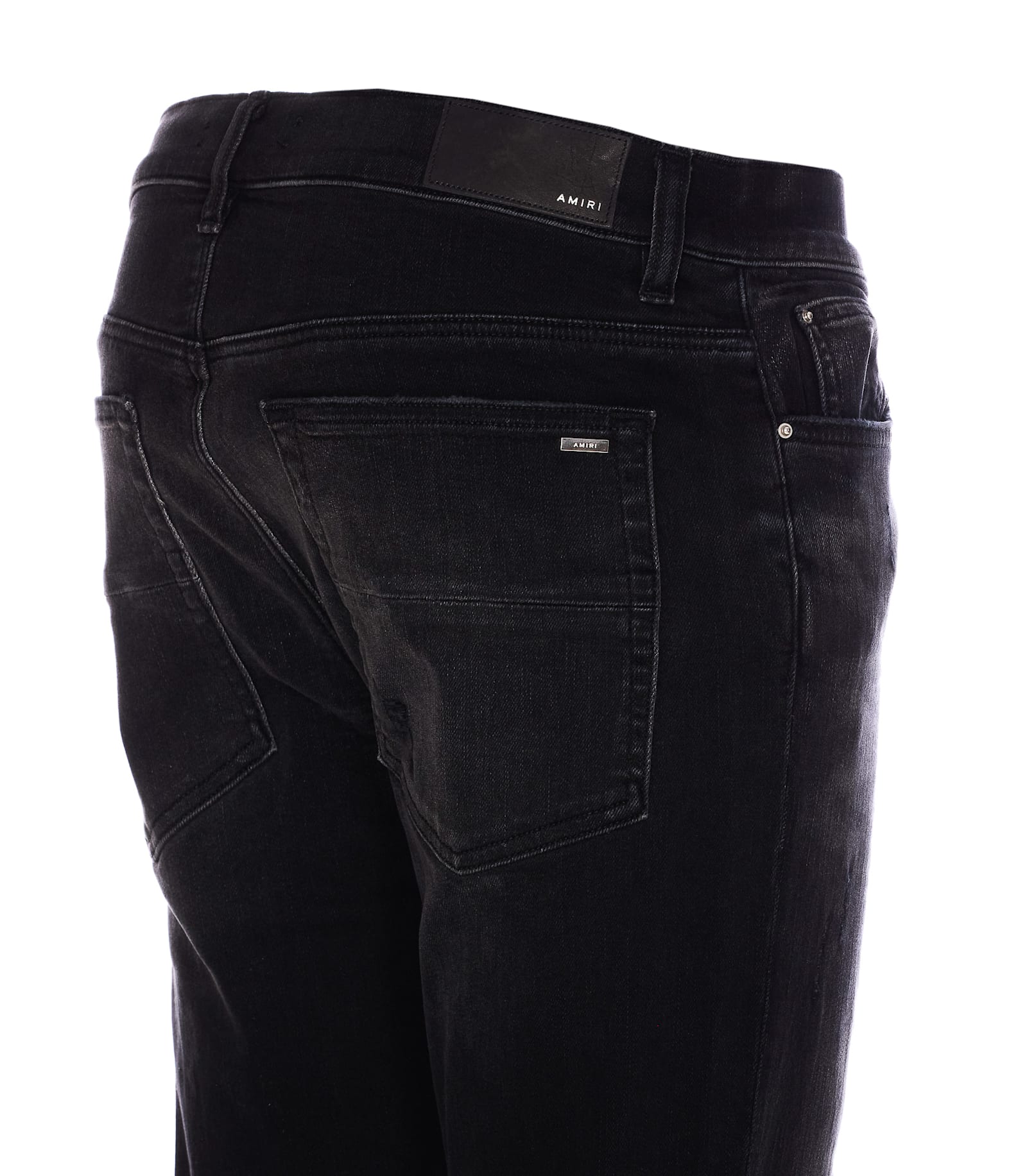 Amiri Slim Fit Distressed Trousers With Rivet Detailing In Black