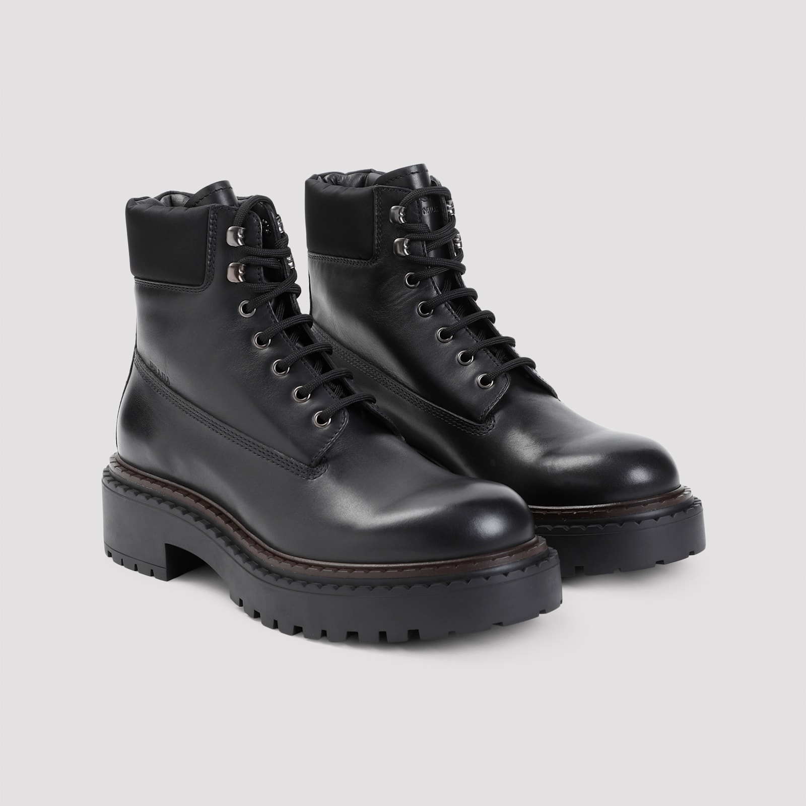 Prada Polished Leather Boots With Sole And Lace-up Design In Nero