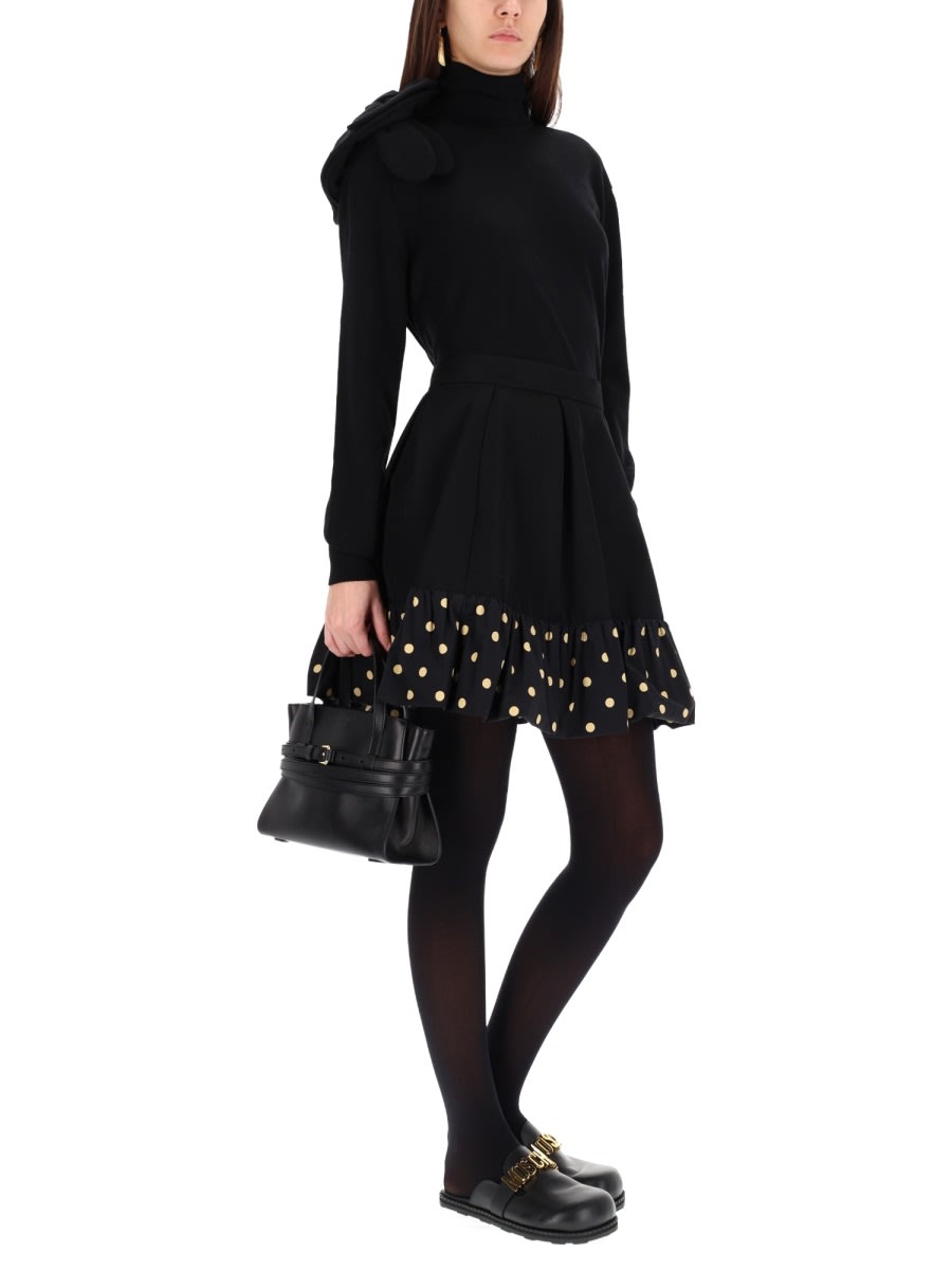 Moschino Black Turtleneck Sweater With Flower Detail In Black