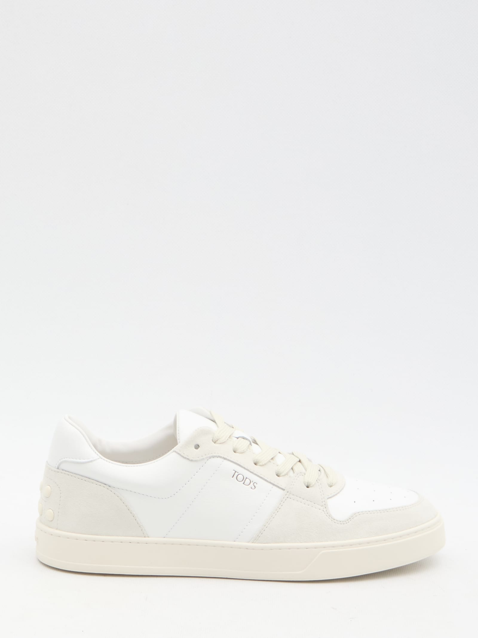 Shop Tod's Leather Sneakers In White