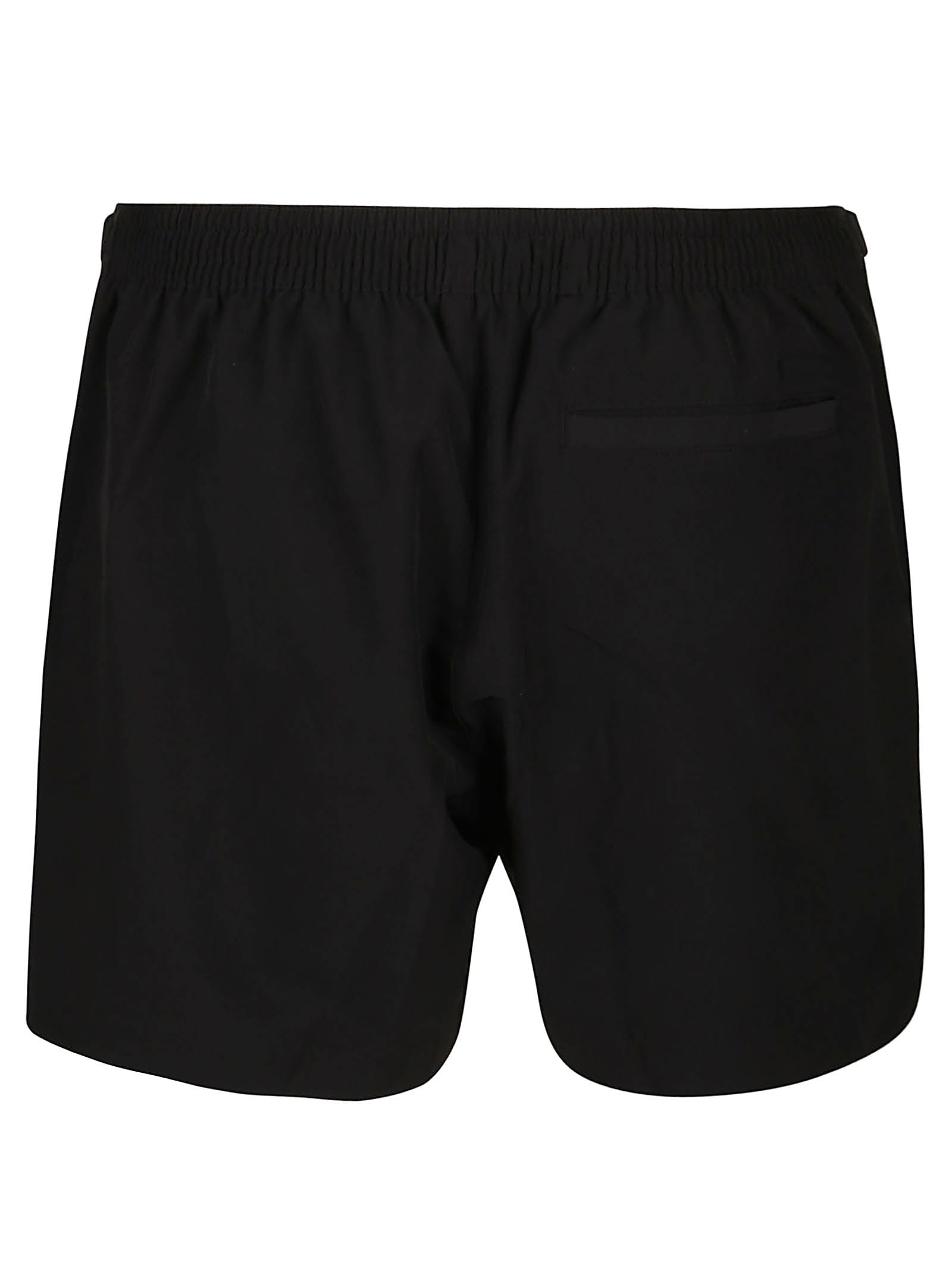 Shop Michael Kors Solid Piped Swim Trunk In Black