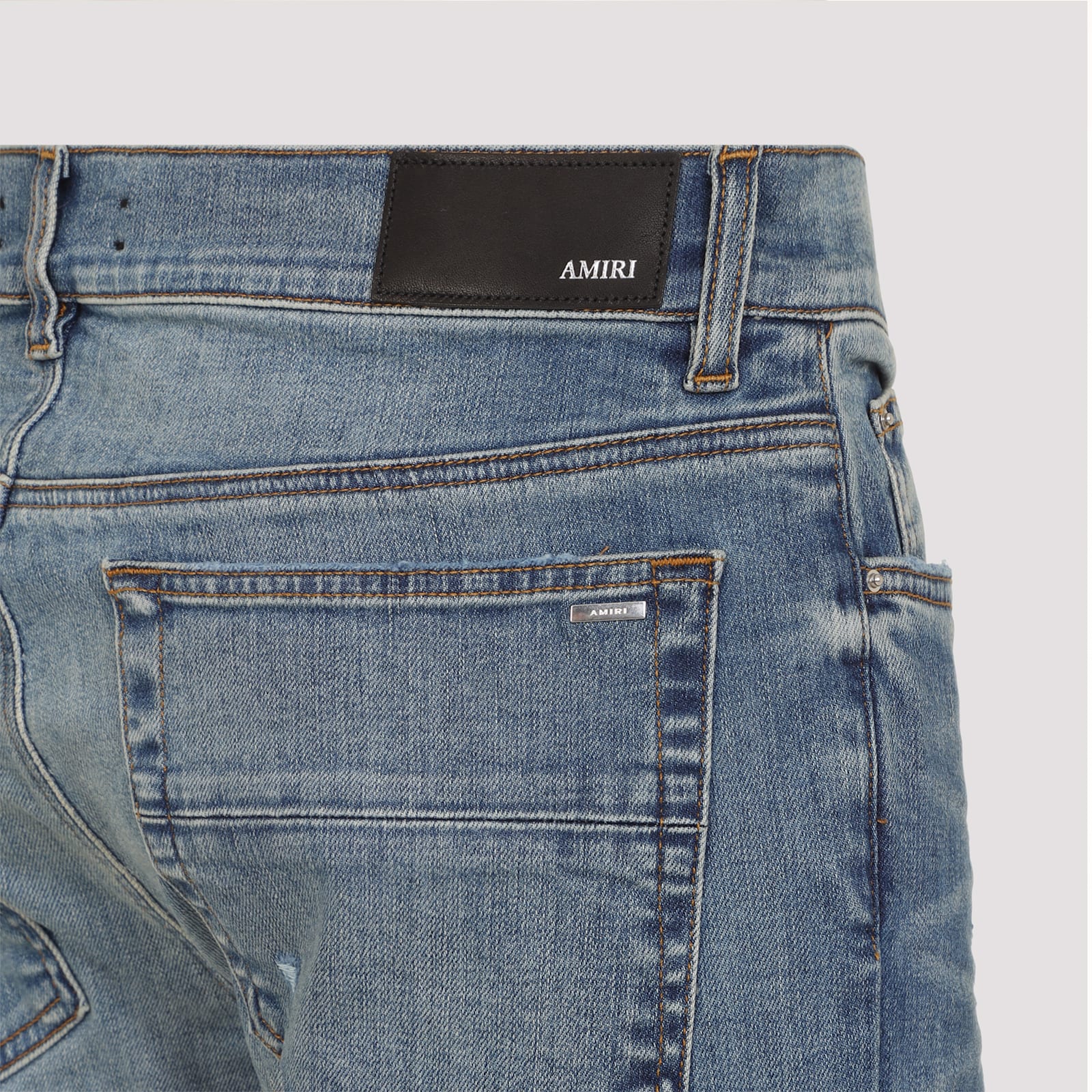 Amiri Stack Low-rise Jeans In Blue