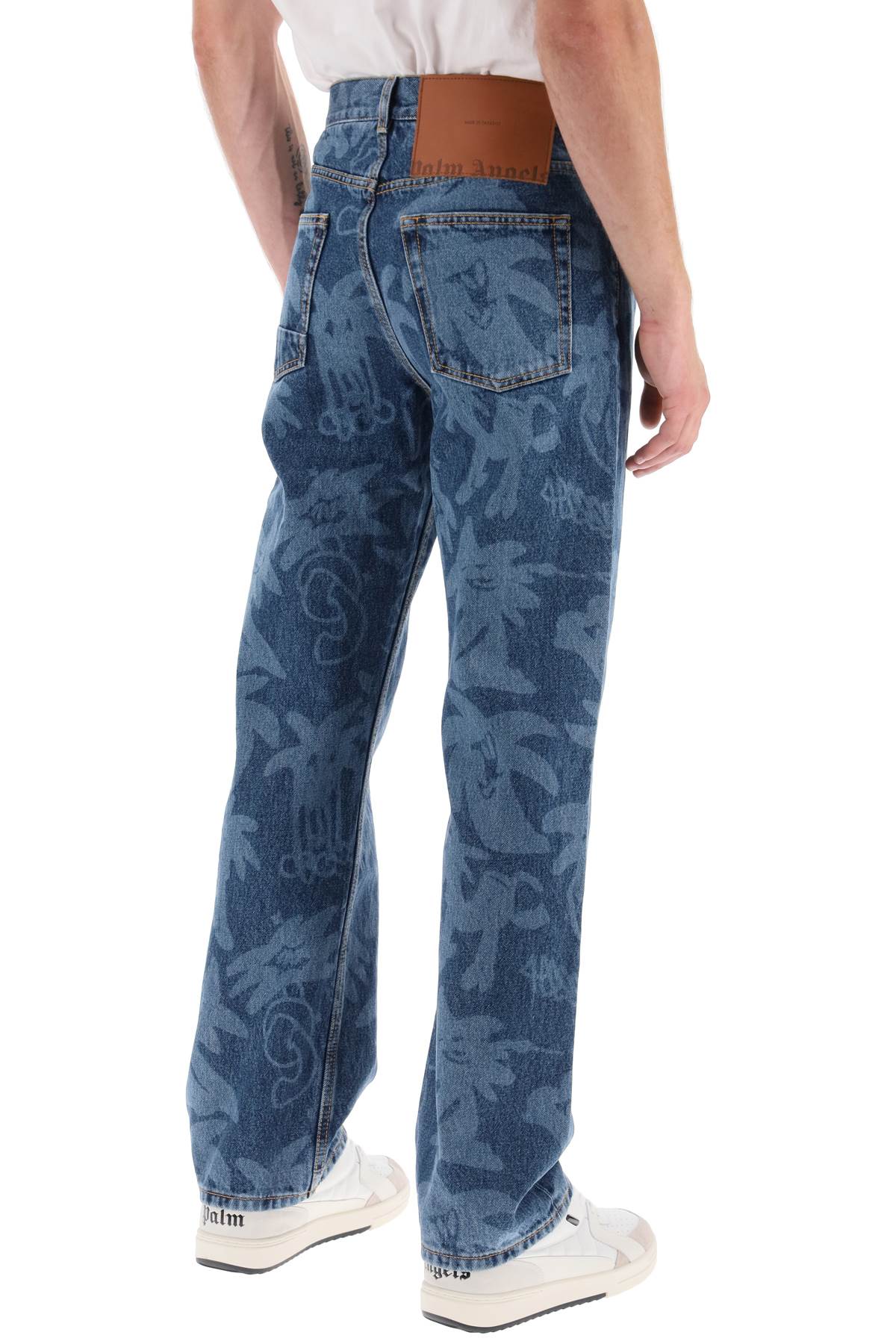 Shop Palm Angels Palmity Allover Laser Denim Jeans In Blue Light