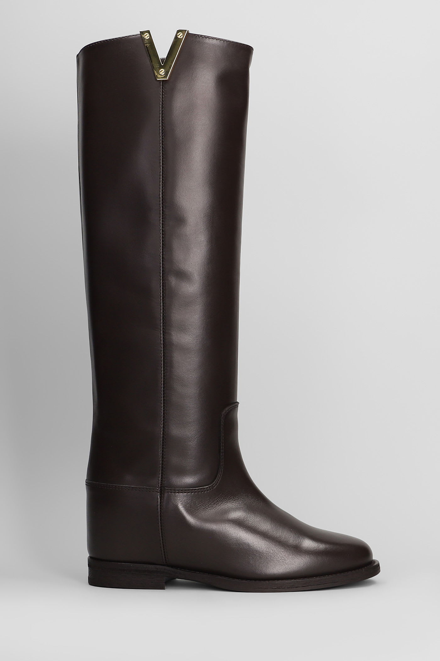 In Dark Brown Leather