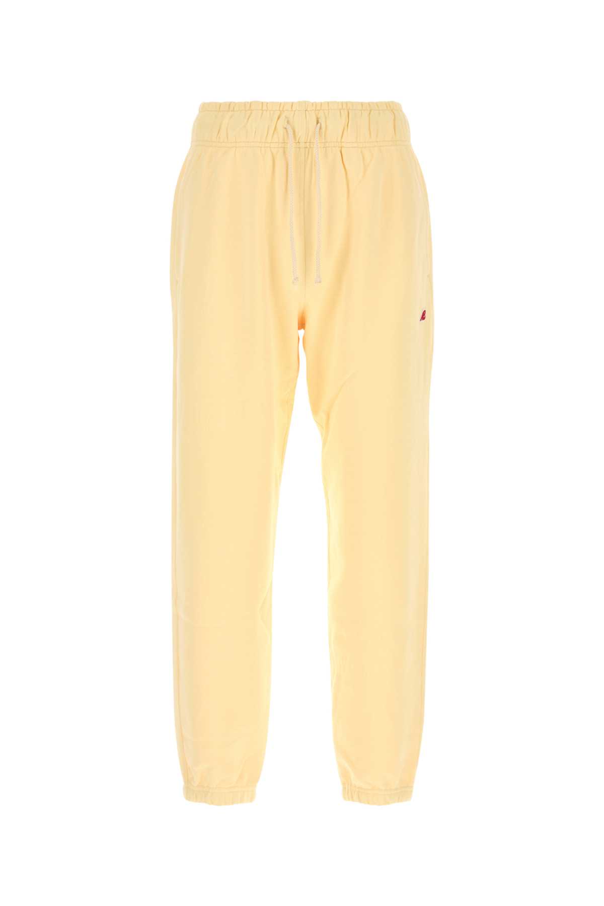 New Balance Cotton Trousers With Elastic Cuffs And Waistband In Yellow