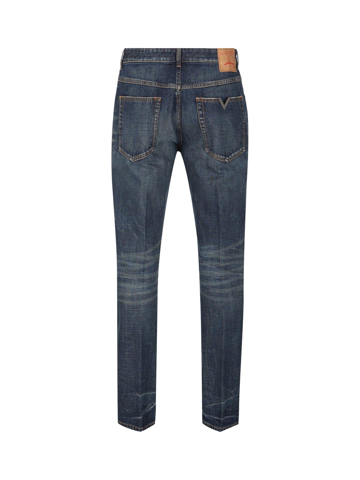 Shop Valentino Logo Patch Mid-rise Jeans In Blue