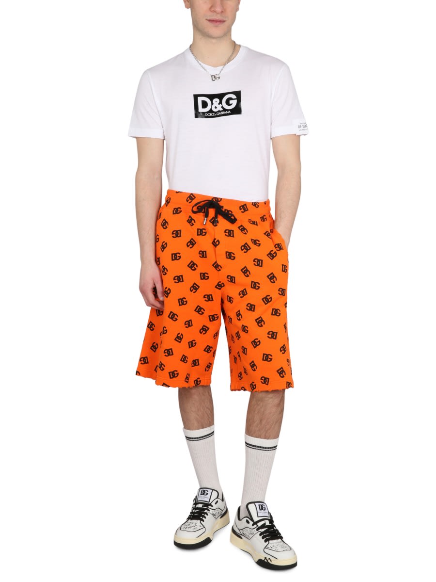 Dolce & Gabbana Logo Waist Drawstring Knee-length Bermuda Shorts In Orange