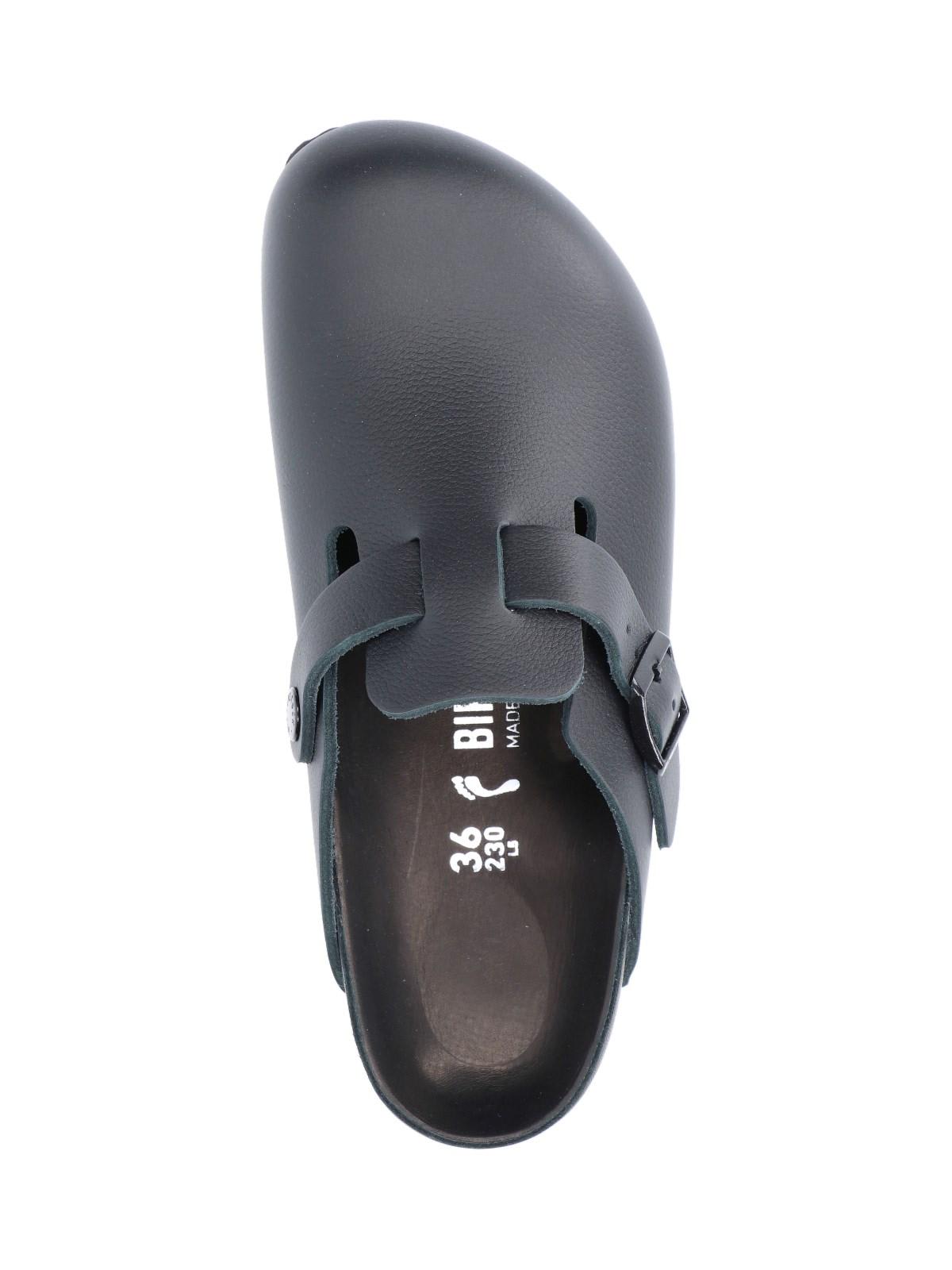 Shop Birkenstock Mules Boston In Black