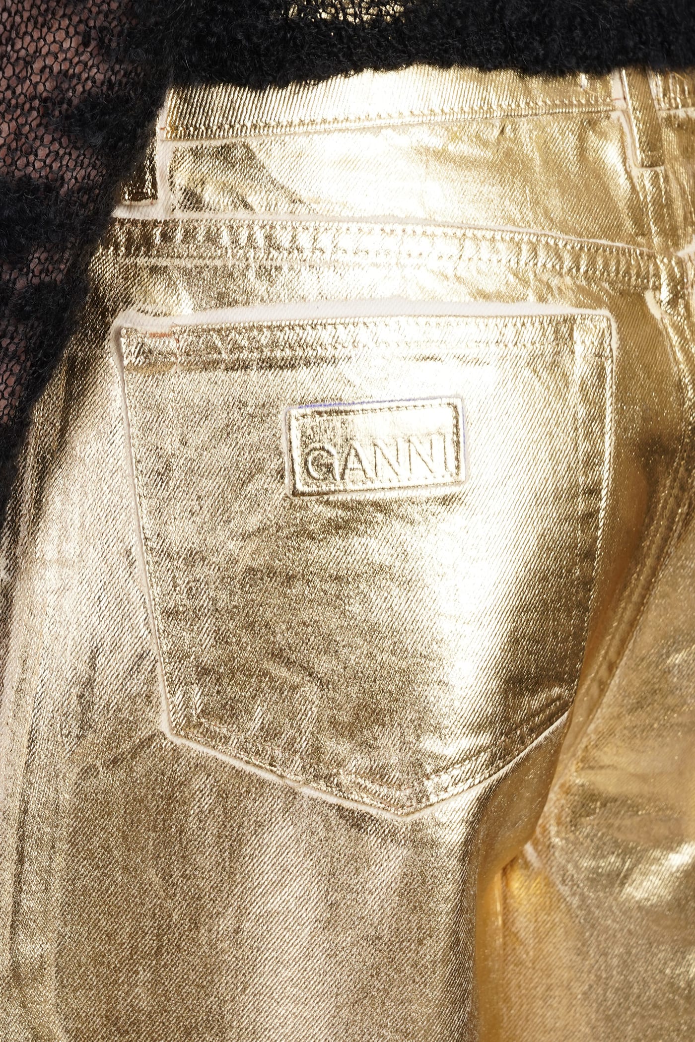 Shop Ganni Jeans In Gold Cotton