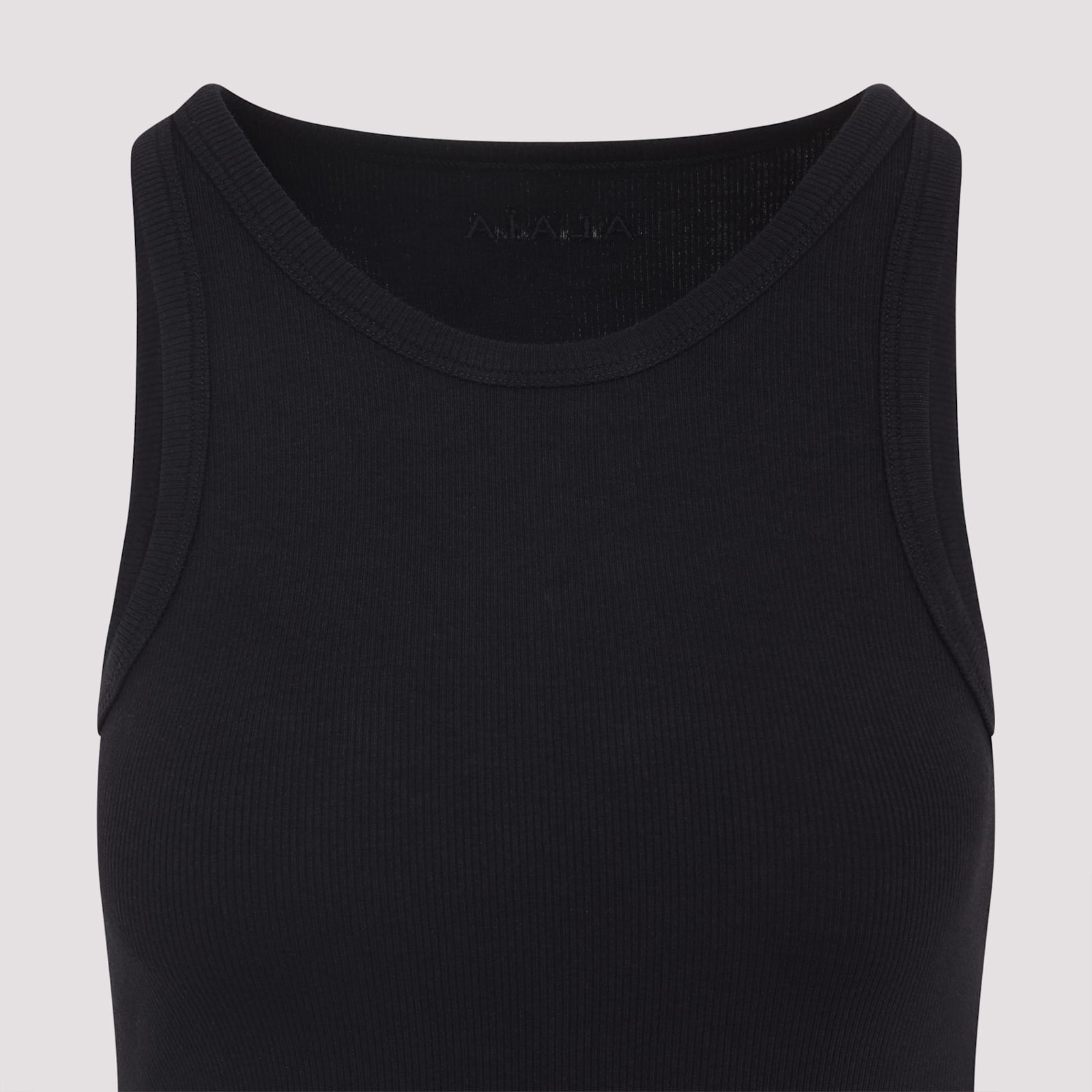 Alaïa Ribbed Texture High Neckline Sleeveless Thong Cut In Black