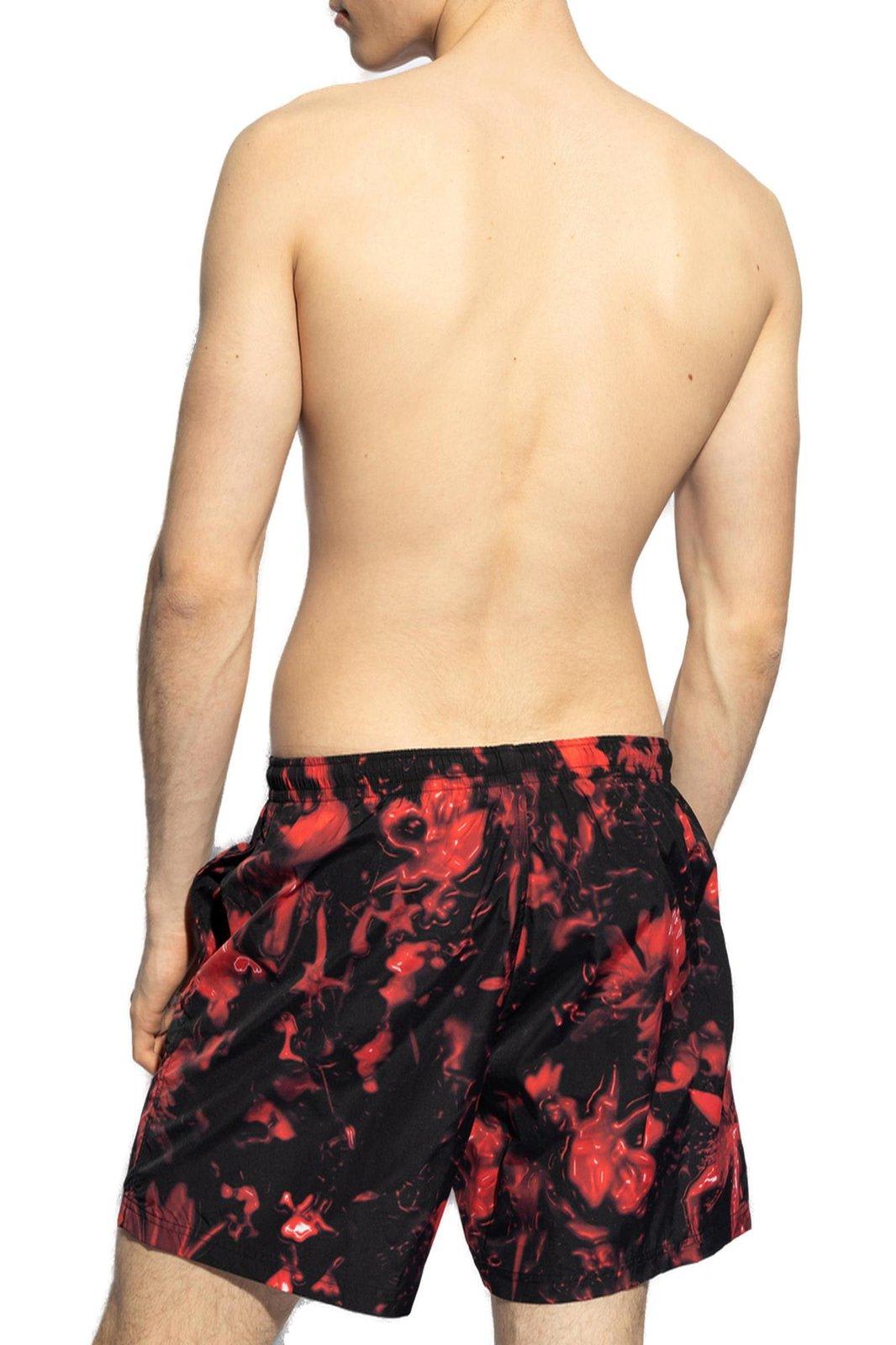 Shop Alexander Mcqueen All-over Printed Swim Shorts In Black/red