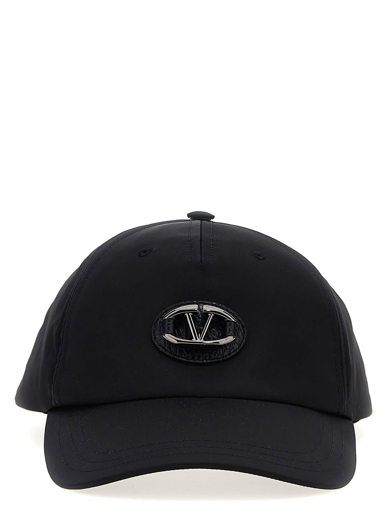 Shop Valentino Garavani Cap In Black