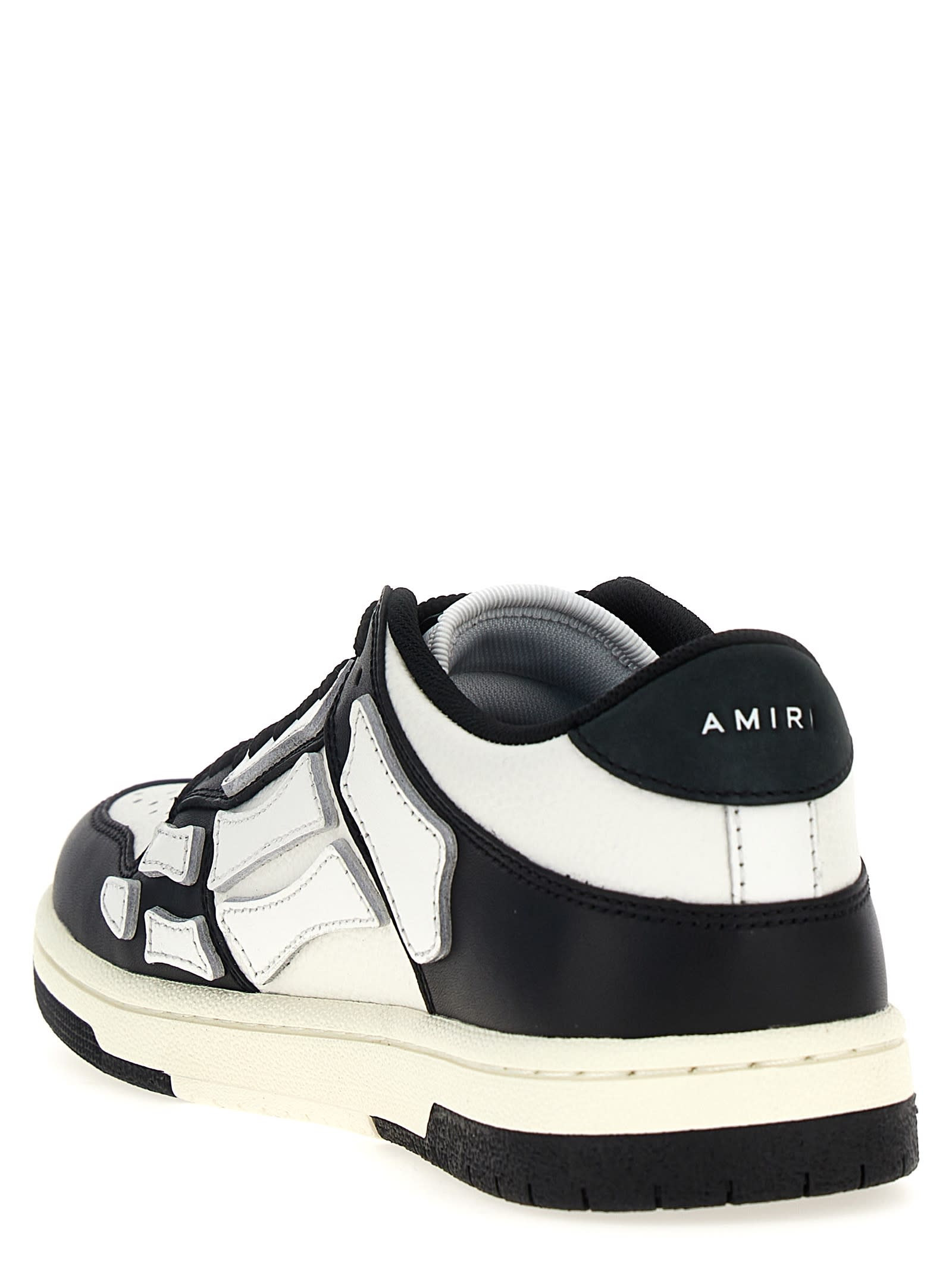 Shop Amiri Skel Top Low Sneakers In White/black