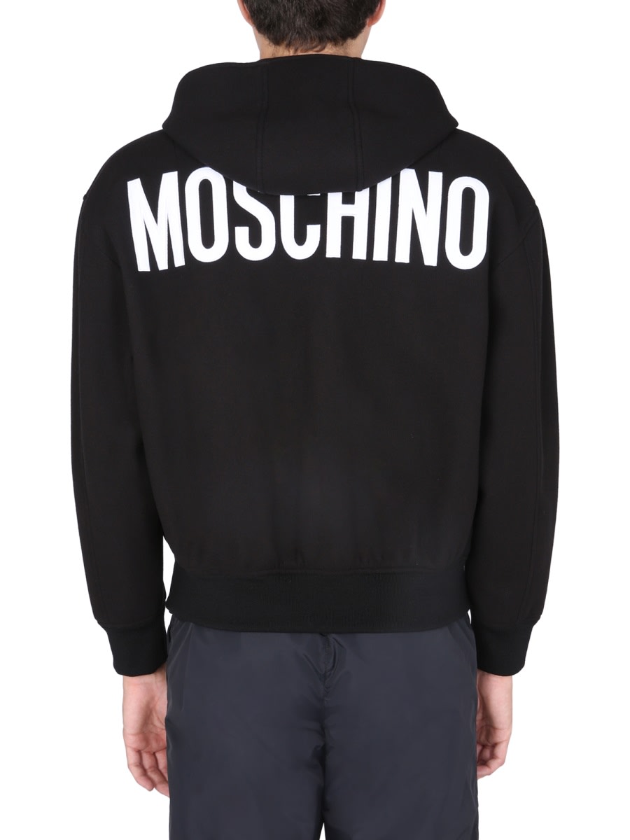 Shop Moschino Jacket With Logo In Black