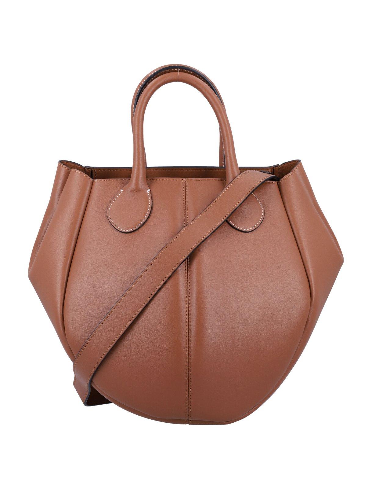 Shop Jw Anderson Small Punch Top Handle Bag In Brown