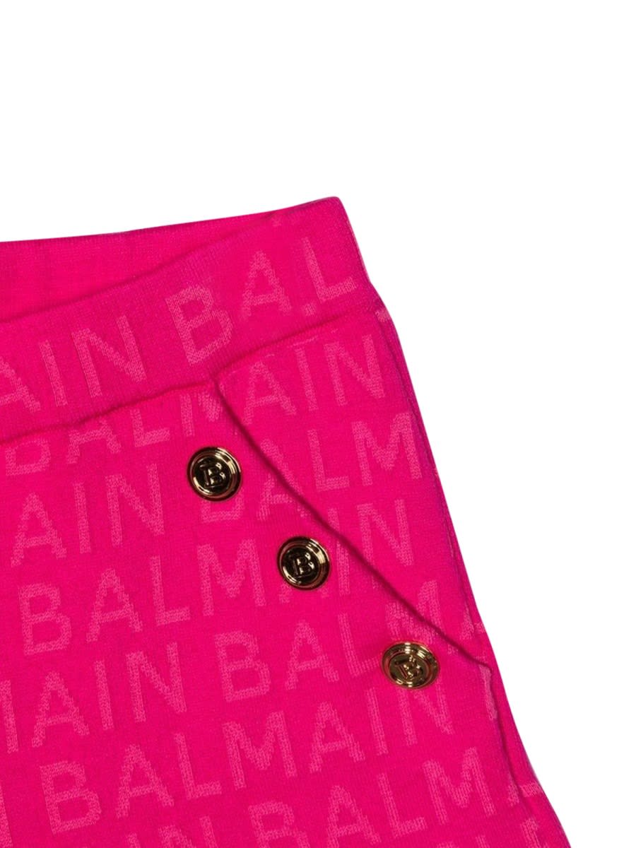 Shop Balmain Bermuda Gold Side Buttons In Fuchsia