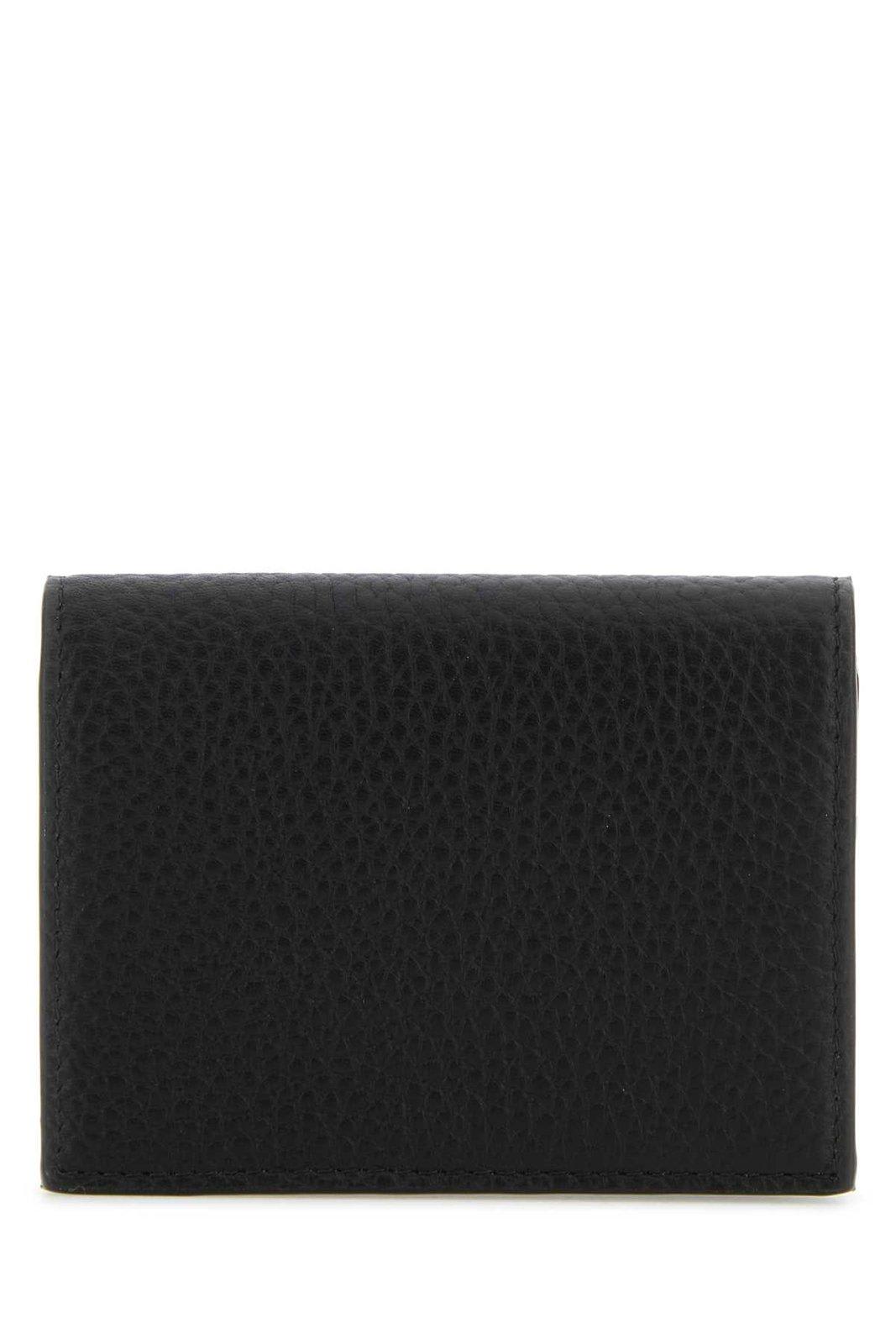 Shop Dolce & Gabbana Logo Embossed Foldover Top Wallet In Nero (black)