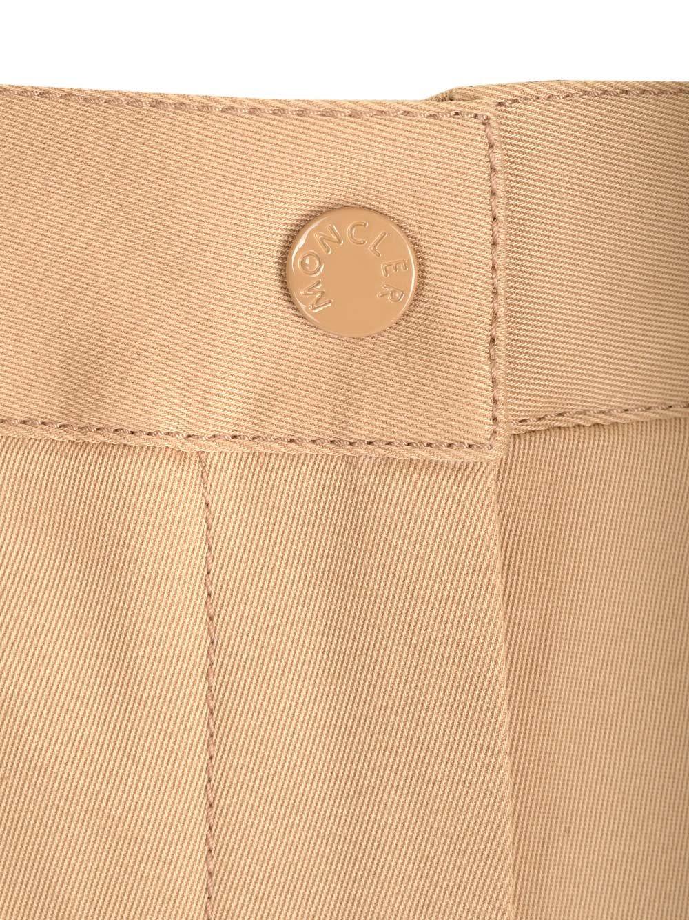 Shop Moncler Logo Patch Pleated Shorts In Beige
