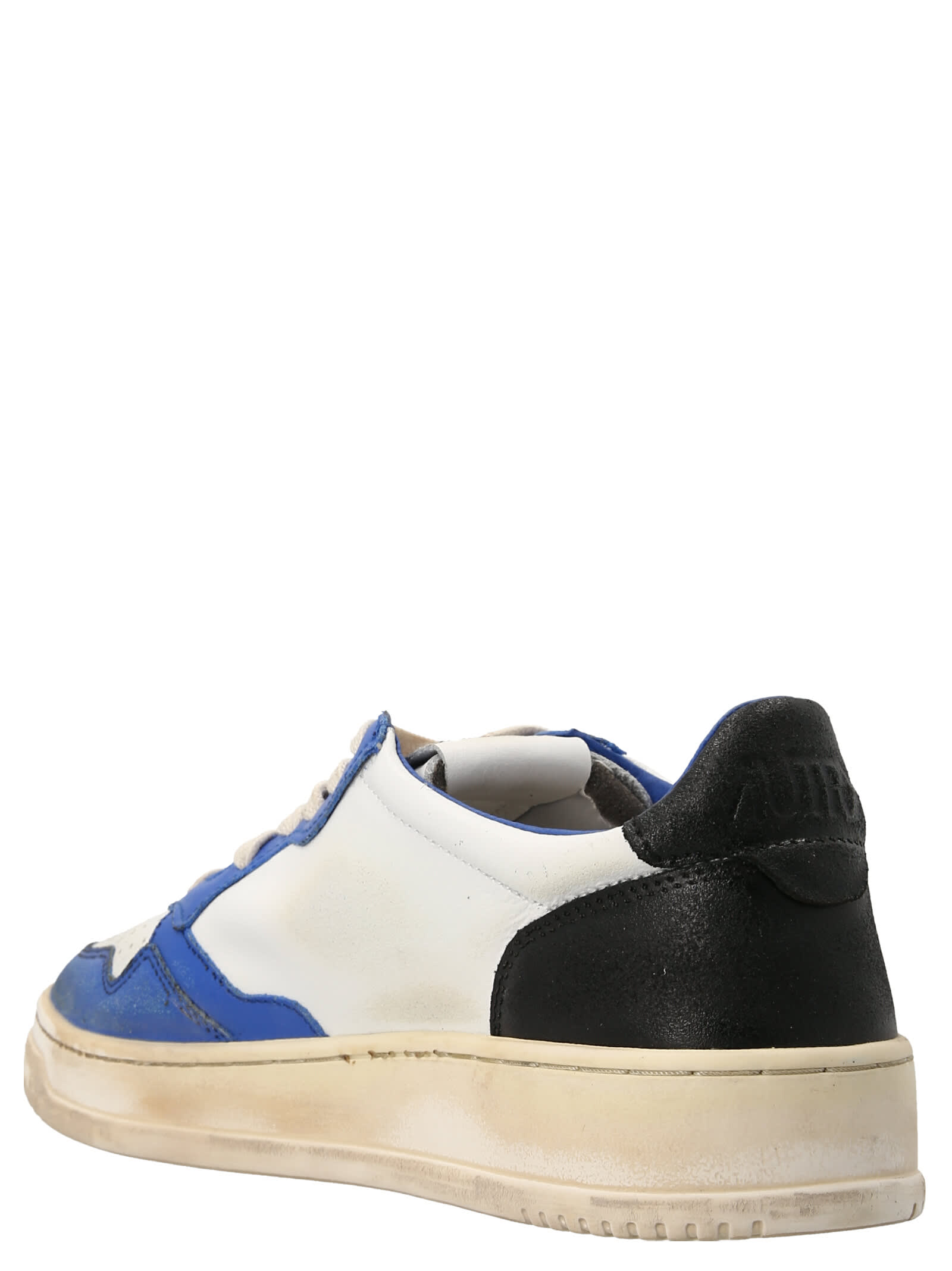 Shop Autry 01 Low Super Vintage Sneakers In White/blue/black