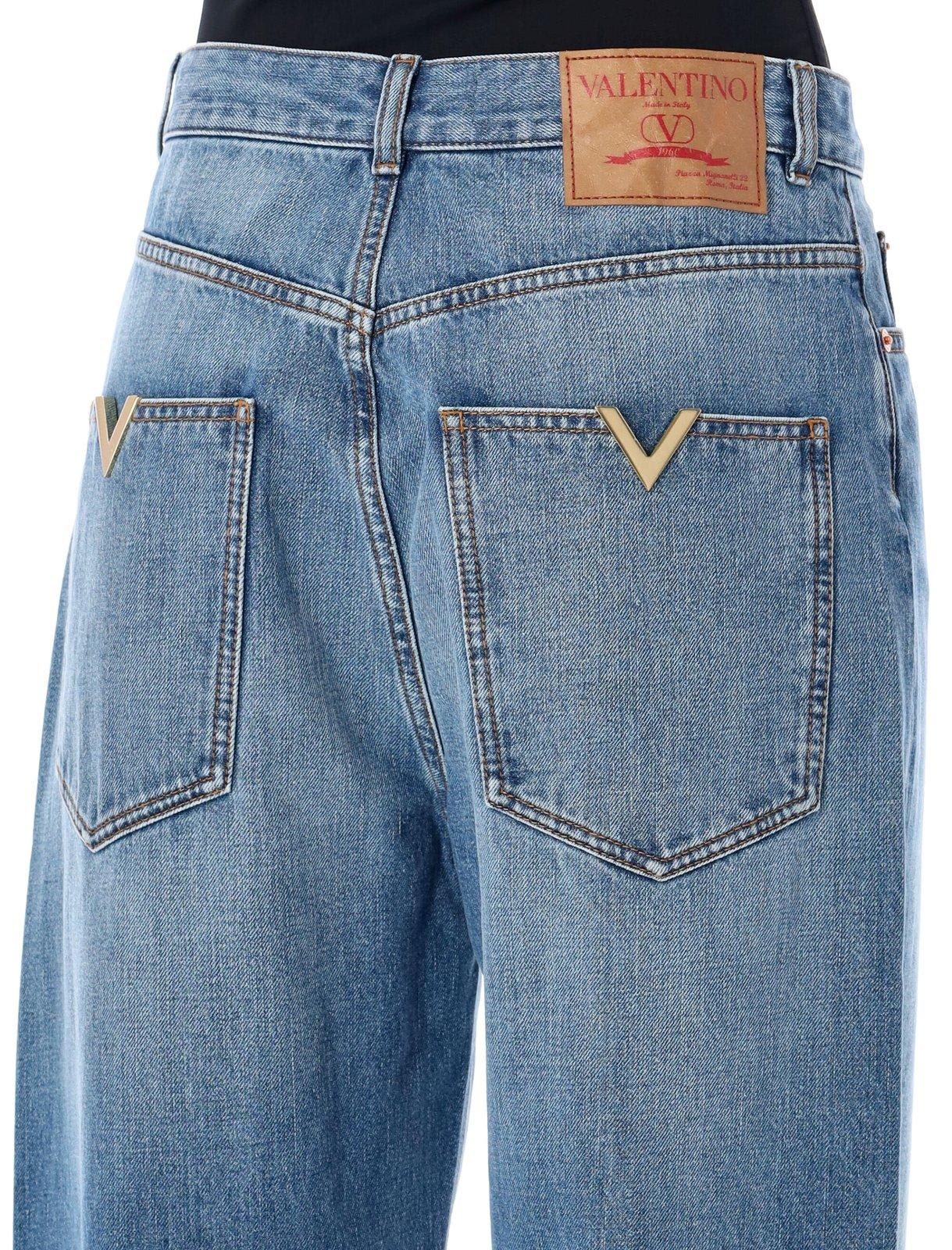 Shop Valentino Logo Patch Wide Leg Jeans
