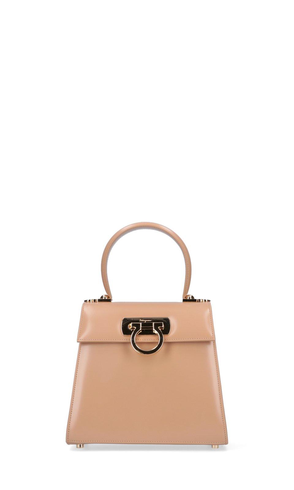 Shop Ferragamo Gancini Top Handle Bag In Beige