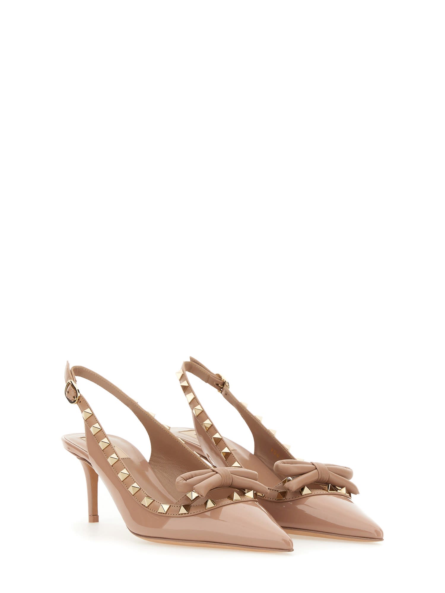 Shop Valentino Rockstud Bow Slingback Pumps In Rose Cannelle