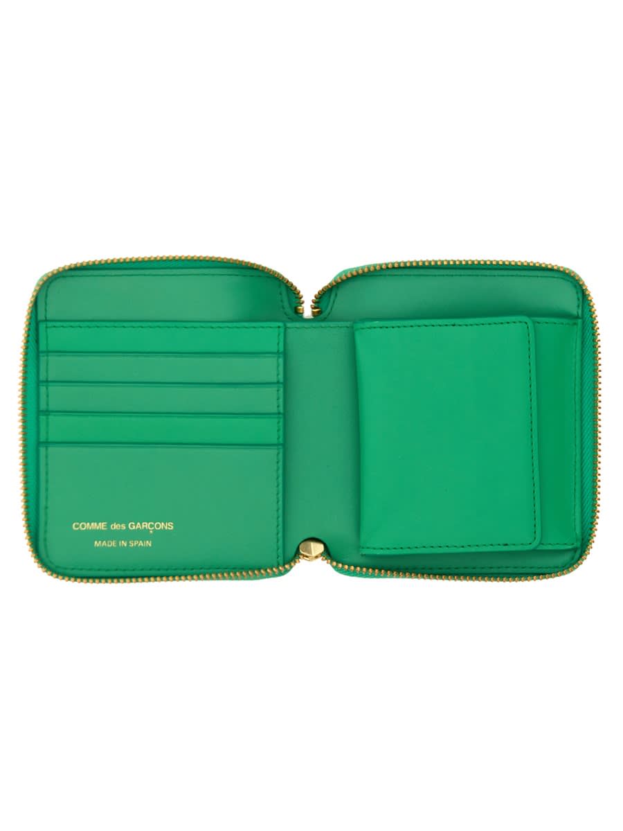 COMME DES GARÇONS ZIP AROUND WALLET