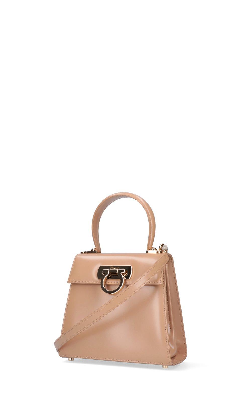 Shop Ferragamo Gancini Top Handle Bag In Beige