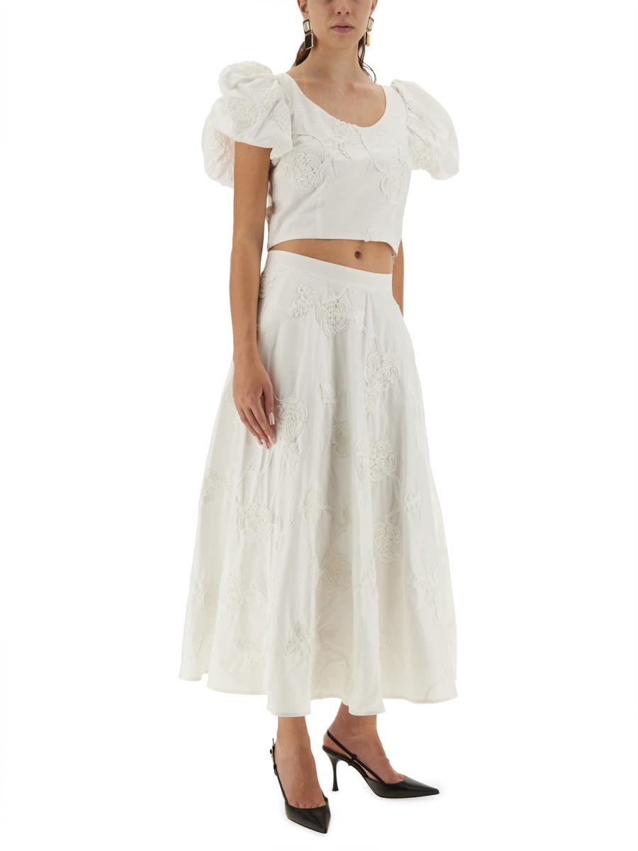 Rotate Birger Christensen Floral Embroidered A-line Midi Skirt In Organic Cotton In White
