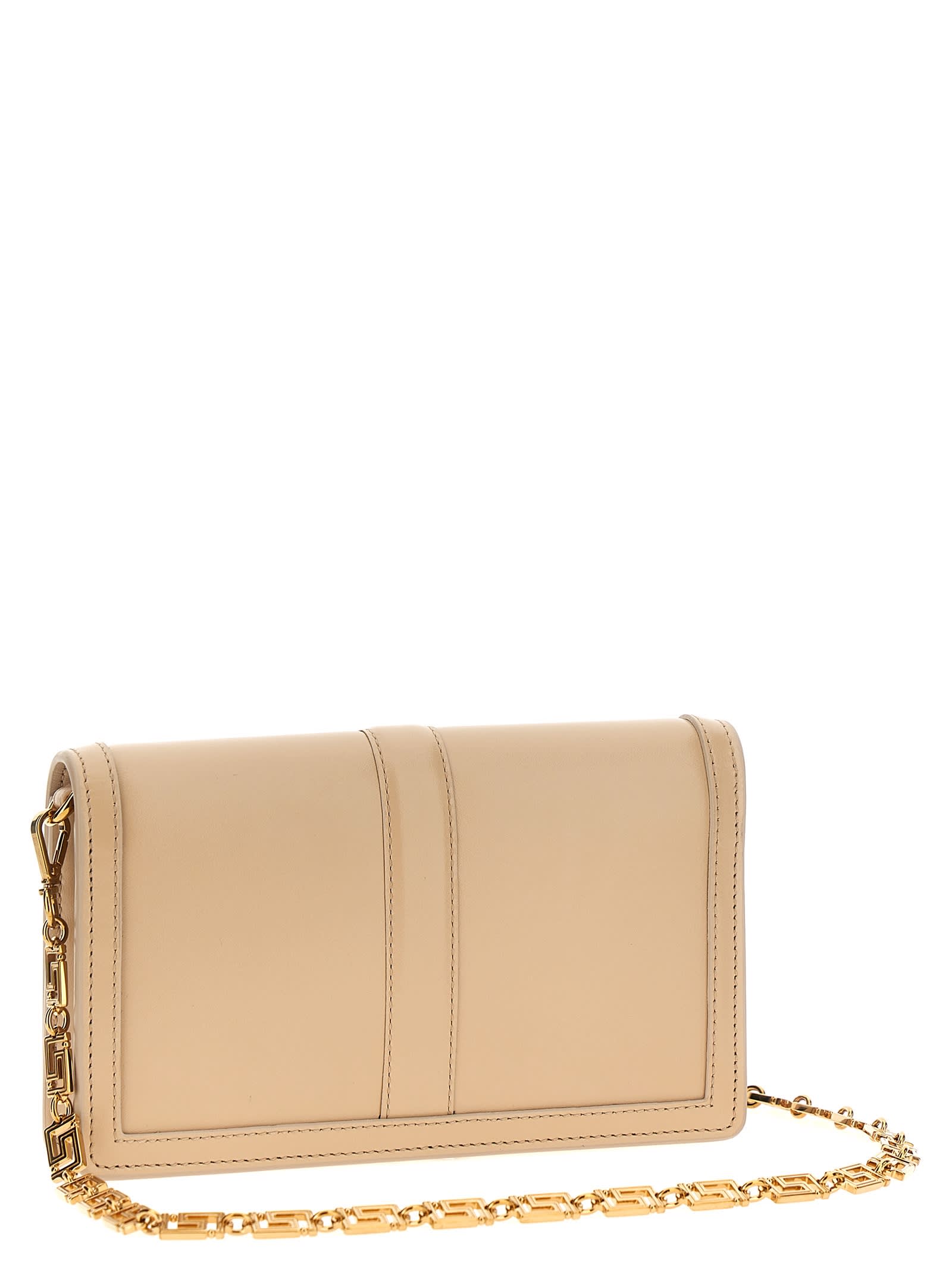 Shop Versace Greca Goddess Clutch In Beige