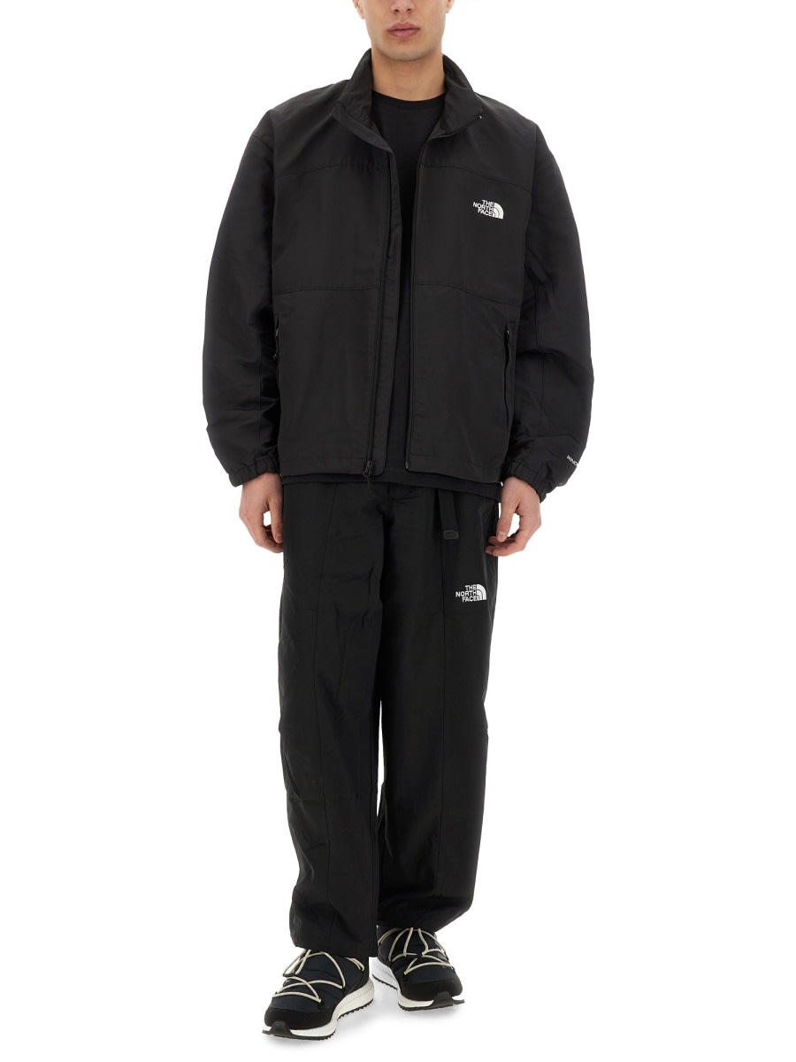 Shop The North Face Tnf Easy Wind Track Jacket In Black