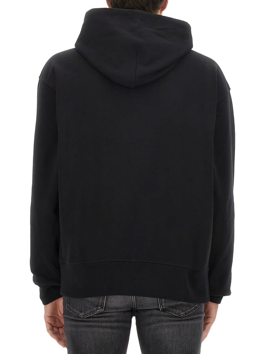 Shop Diesel Logo Hoodie In Black