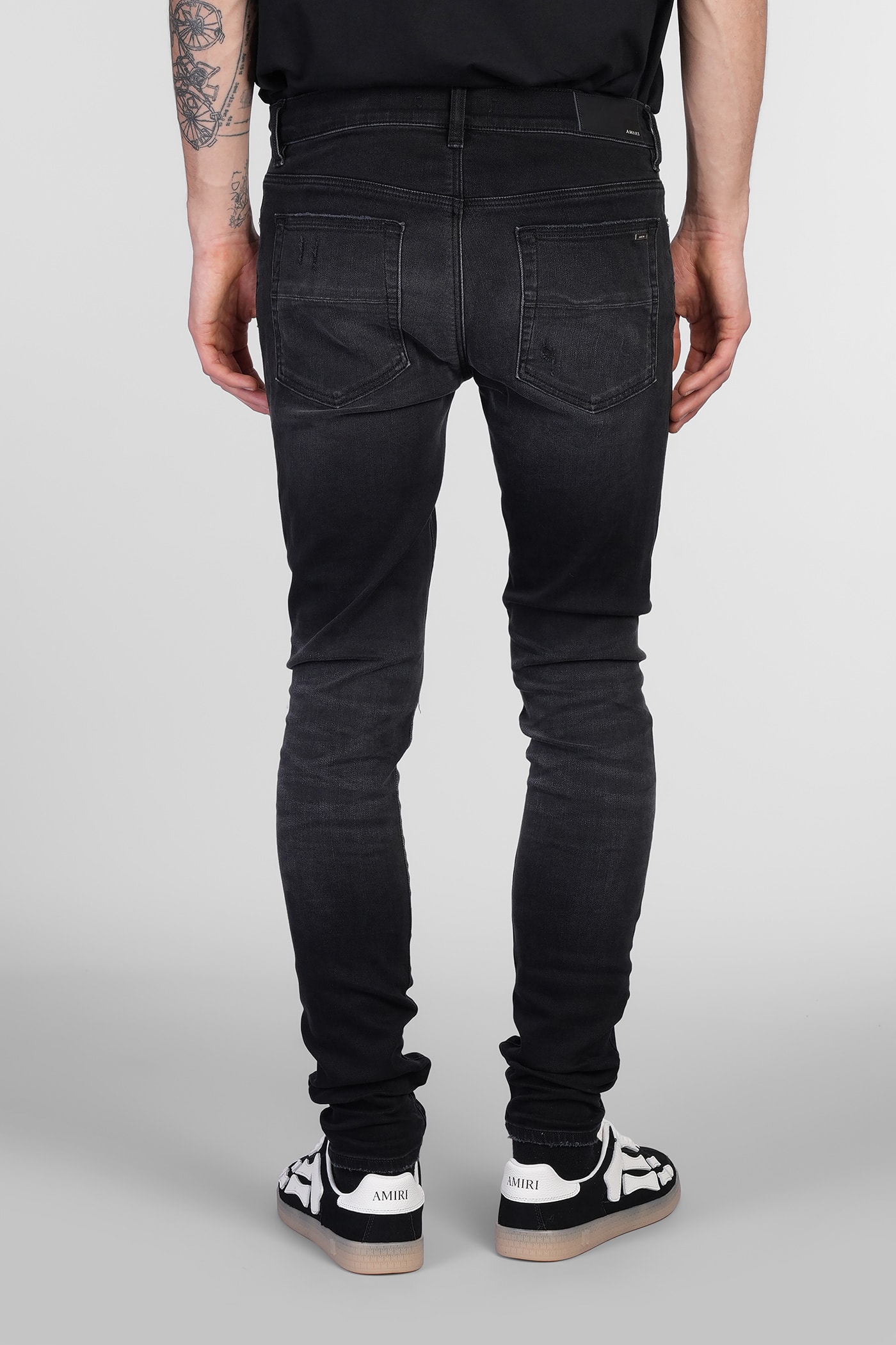 Amiri Stretch Denim Jeans Distressed Detailing In Black