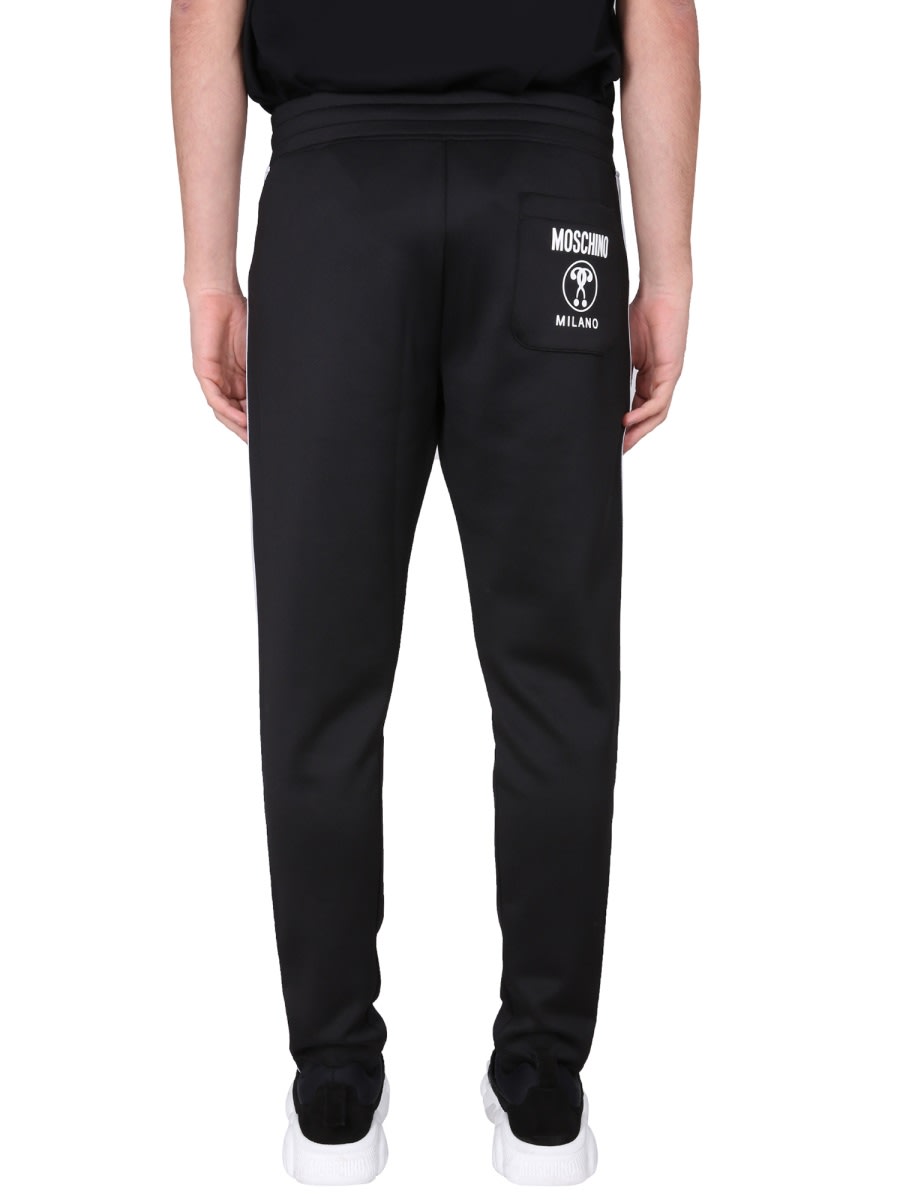 Moschino Jogging Pants With Adjustable Drawstring And Zippered Pockets In Black