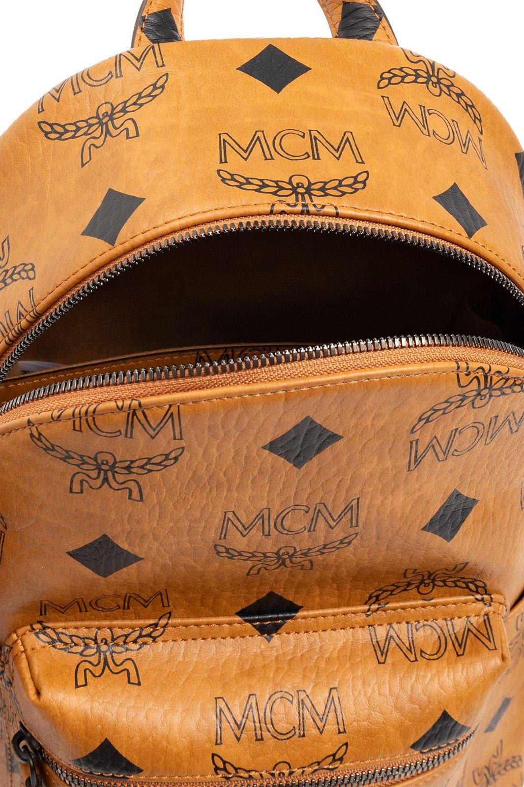Shop Mcm All-over Logo Printed Zipped Backpack In Brown/black