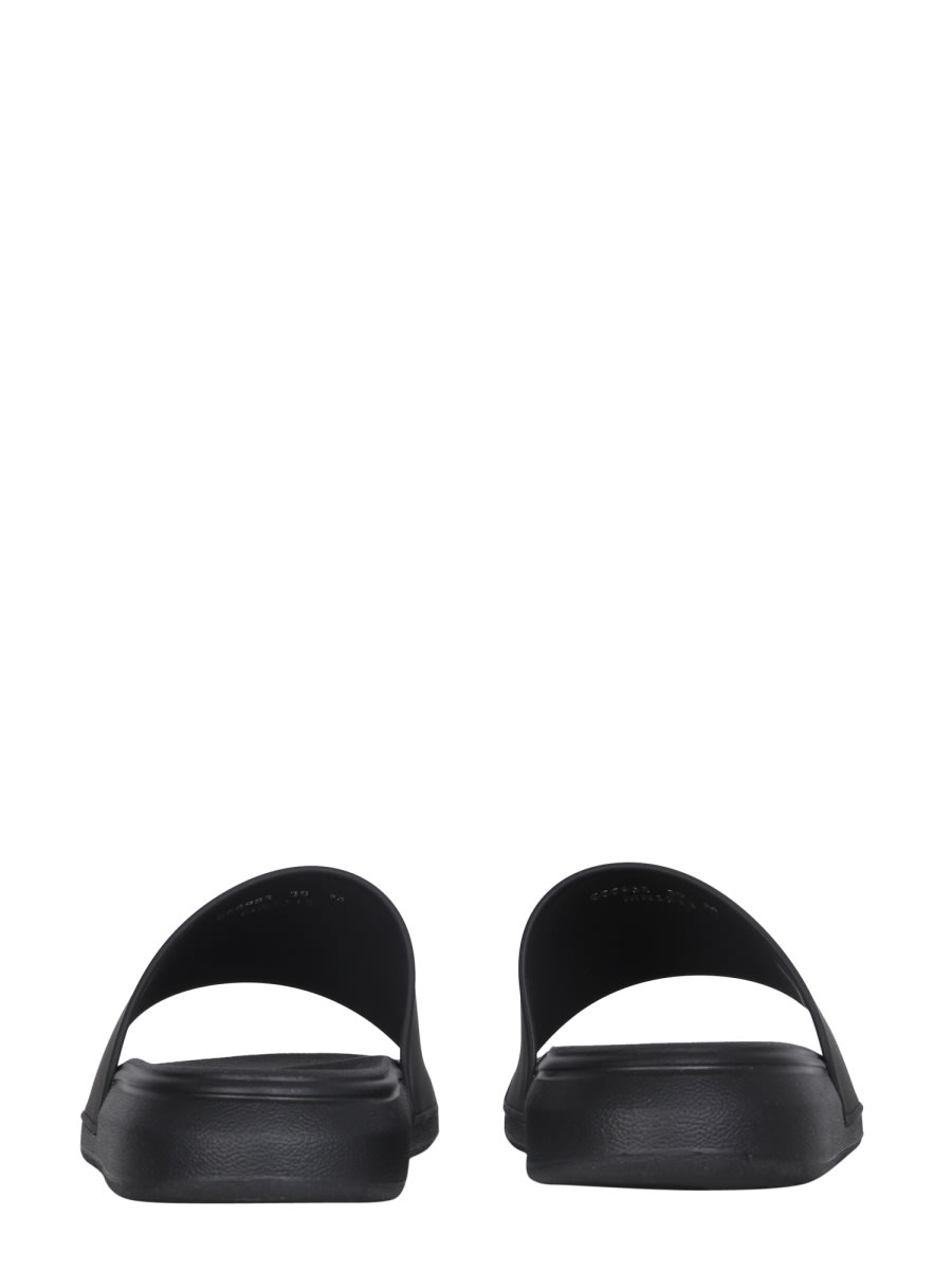 Shop Alexander Mcqueen Rubber Slide Sandals In Black