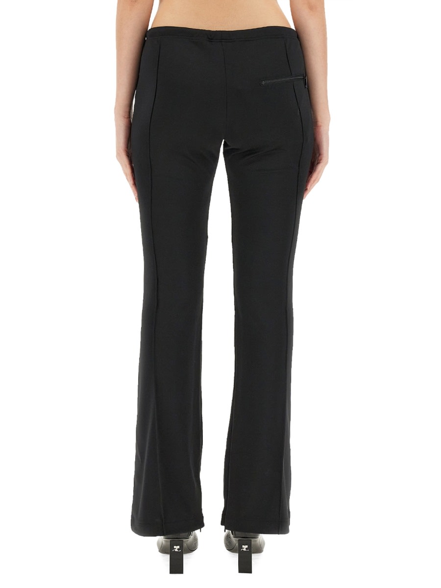 Shop Courrèges Slim Fit Pants In Black