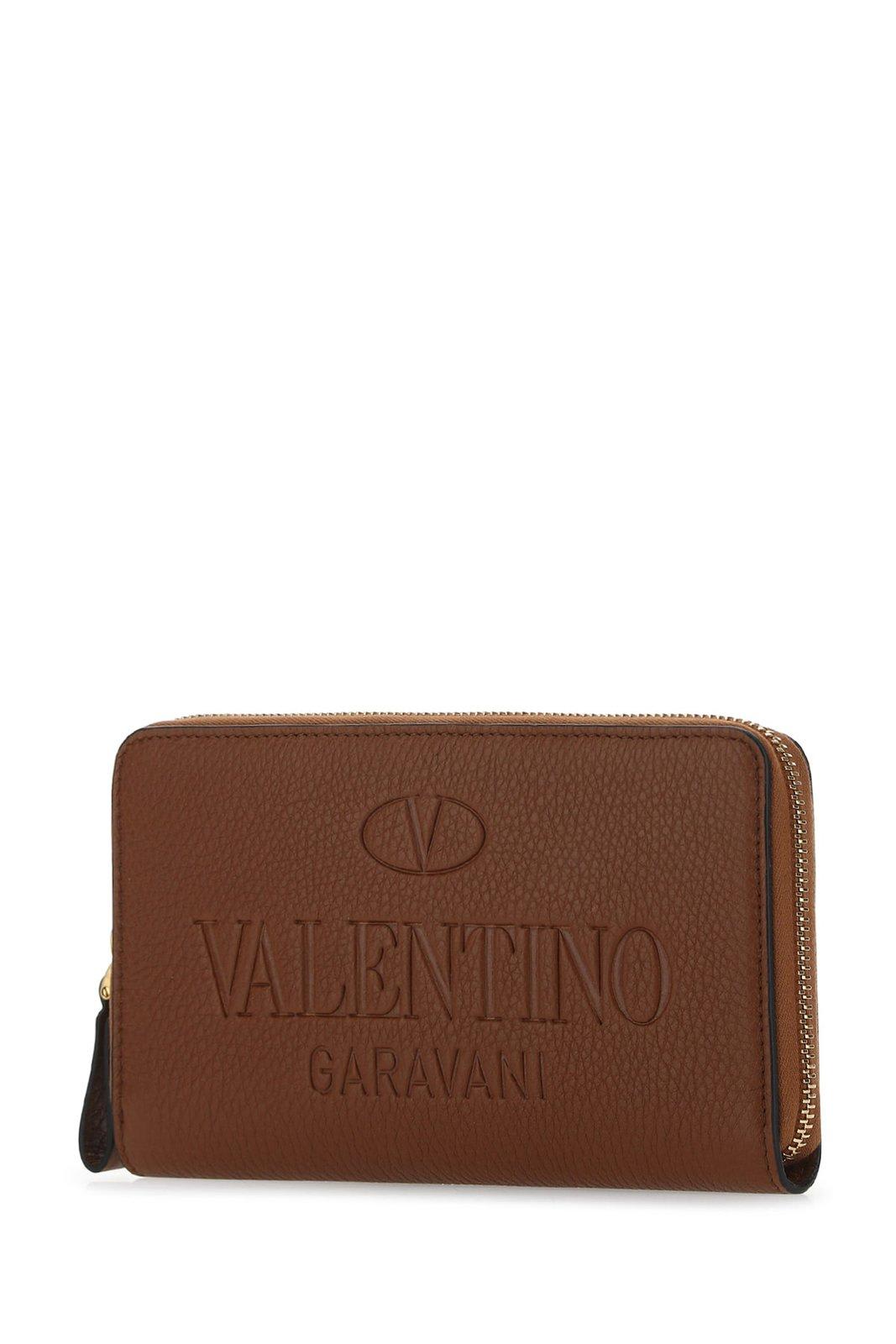 Shop Valentino Logo Debossed Zip-up Wallet In Selleria/antique Brass