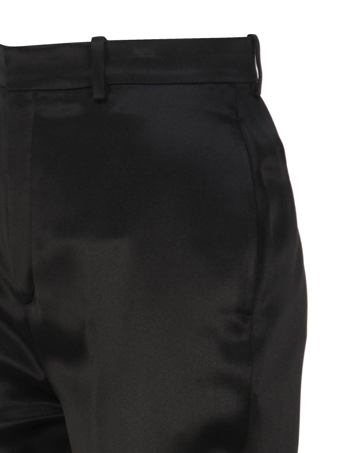 Shop Saint Laurent High-rise Pleated Trousers In Black