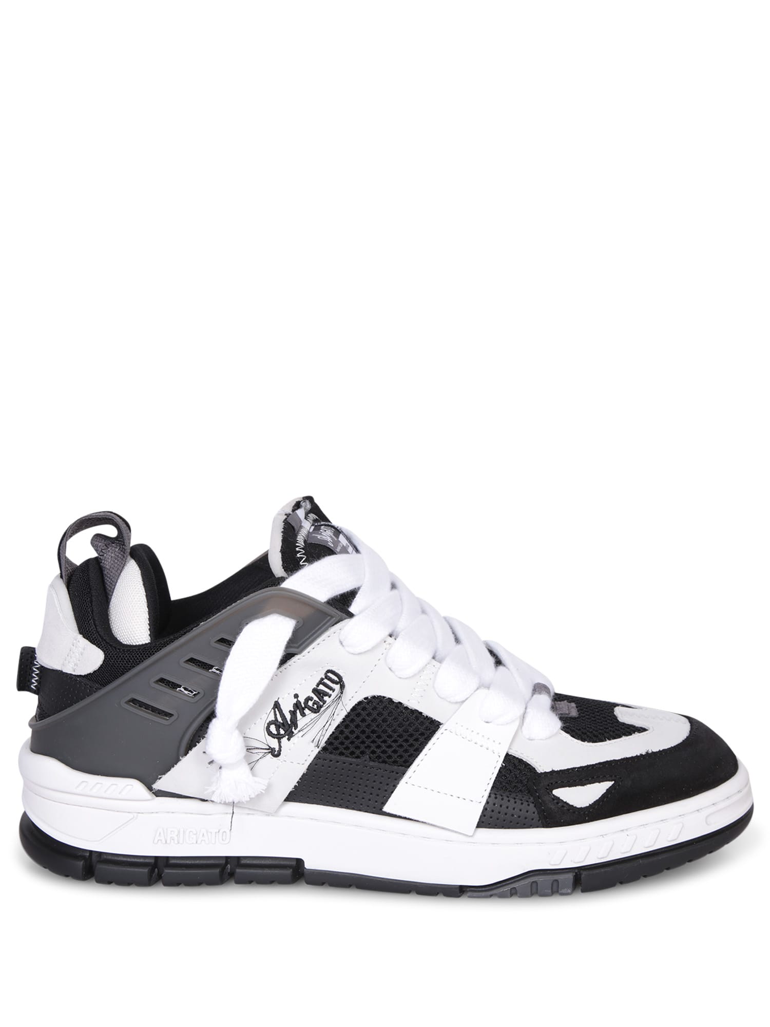 Shop Axel Arigato Area Patchwork Black/white Sneakers