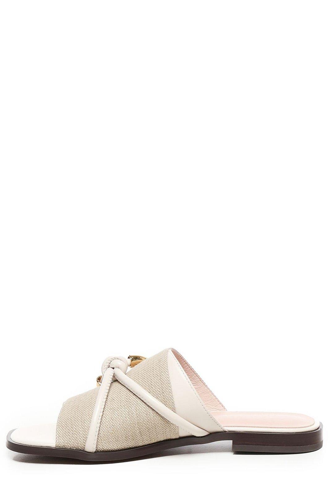 COCCINELLE CARMY SLIP-ON SANDALS
