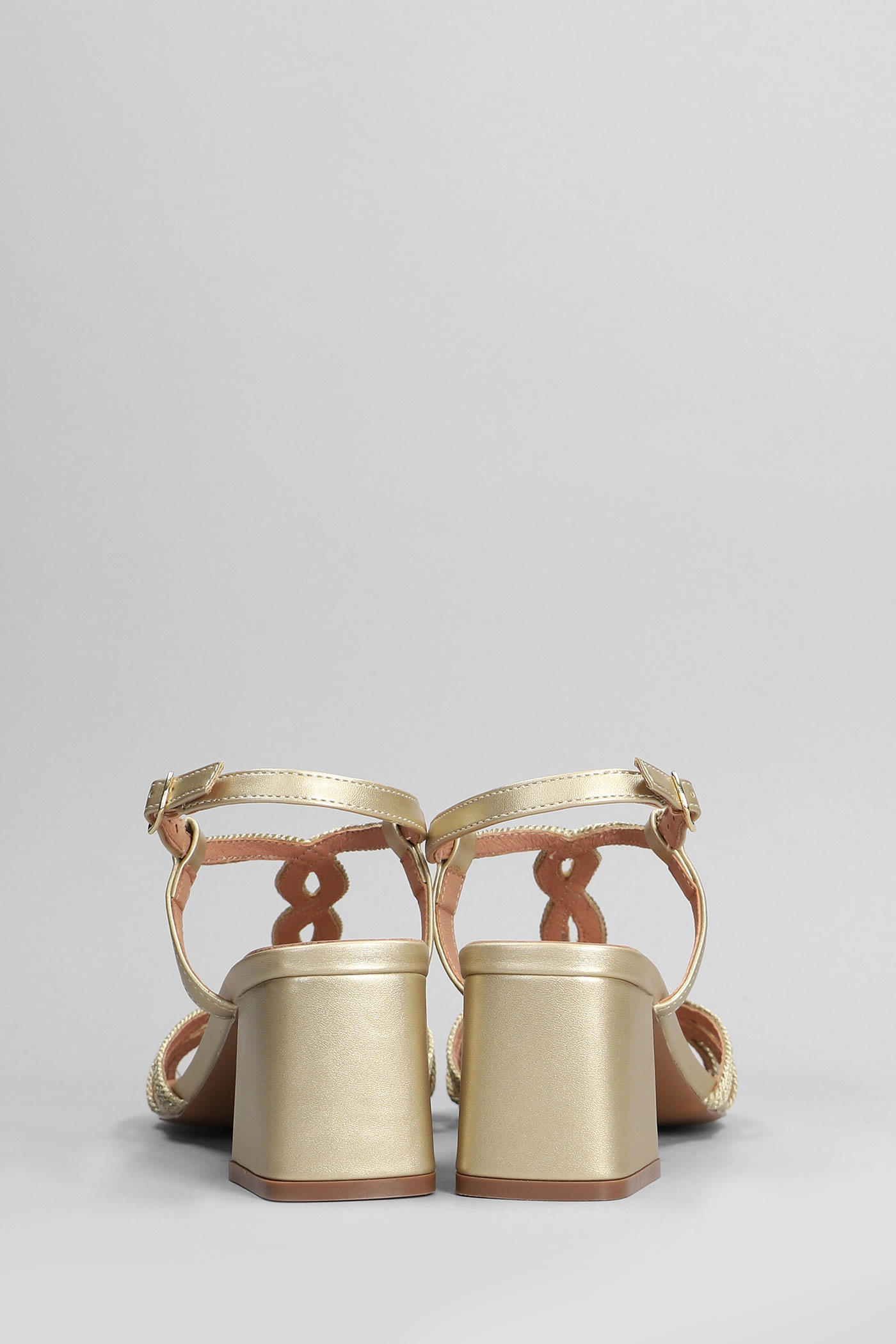 Shop Bibi Lou Pend Sandals In Gold Leather